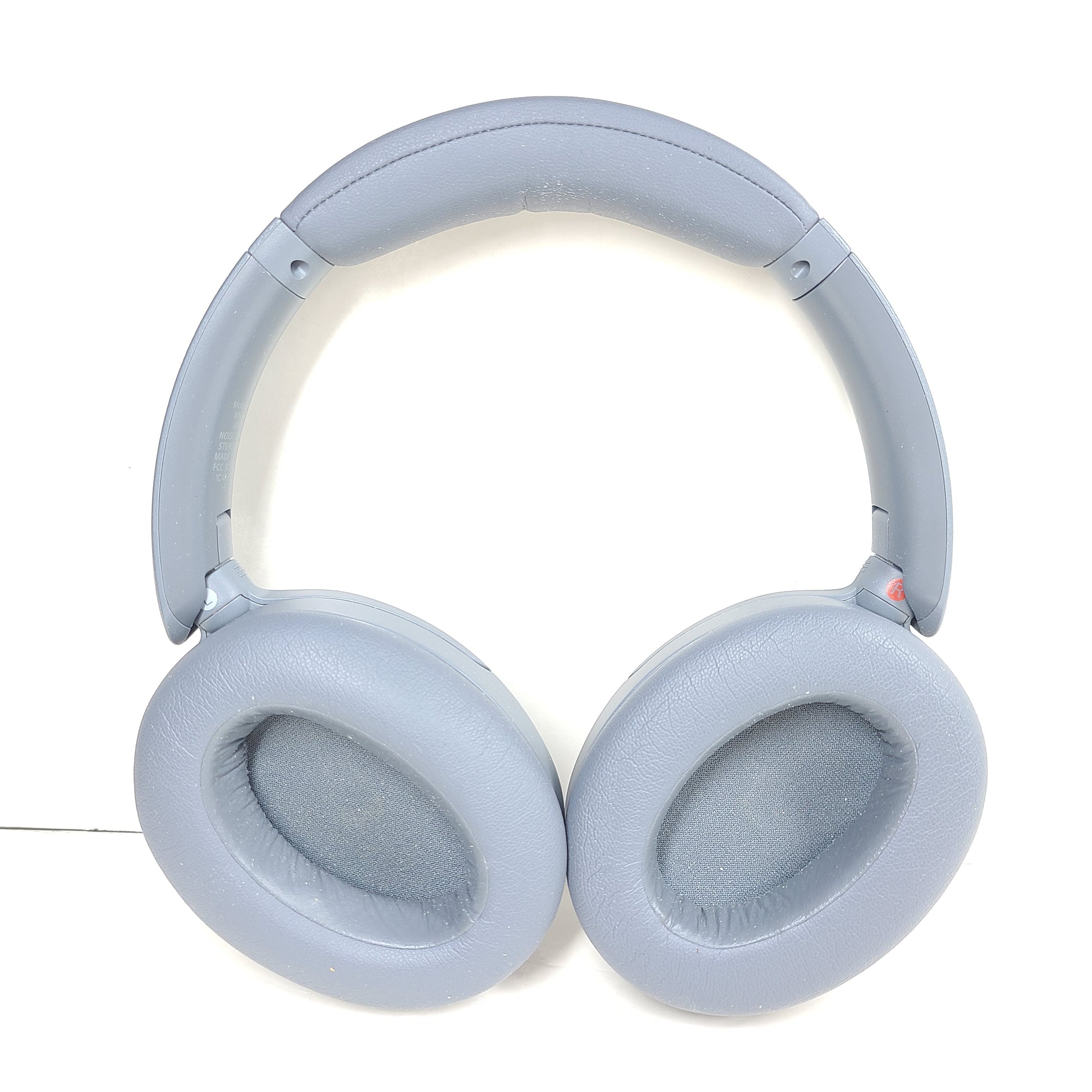 Over-ear Sony WH-CH710N headphones in gray with wireless noise-cancelling design and cushioned headband.