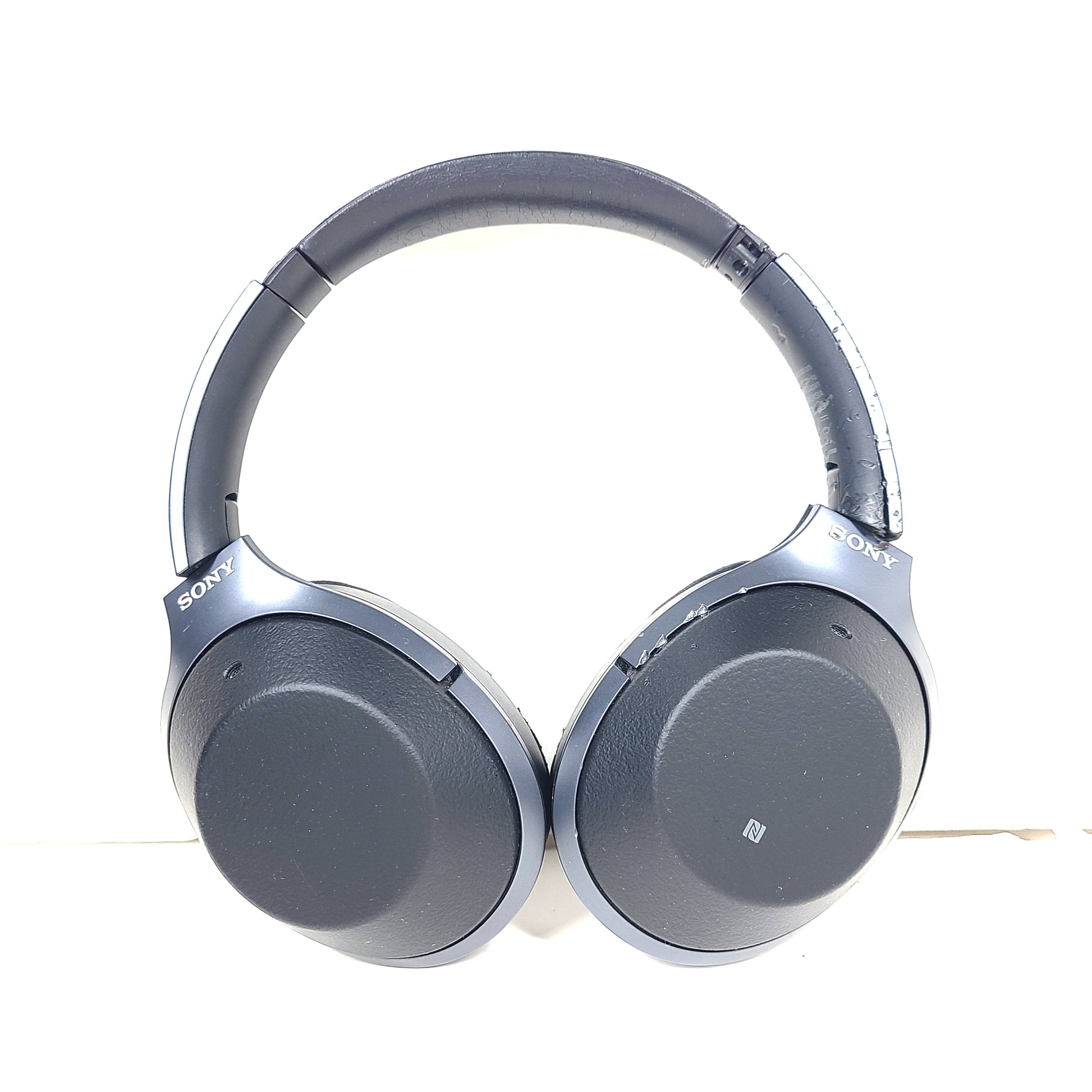 Black Sony WH-H900N wireless noise-cancelling headphones with cushioned ear pads and headband design.
