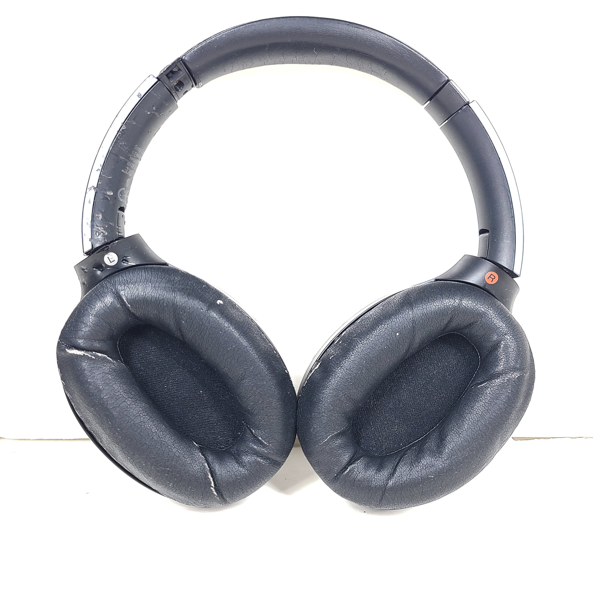 Black Sony WH-H900N wireless noise-cancelling headphones with cushioned ear pads and headband design.