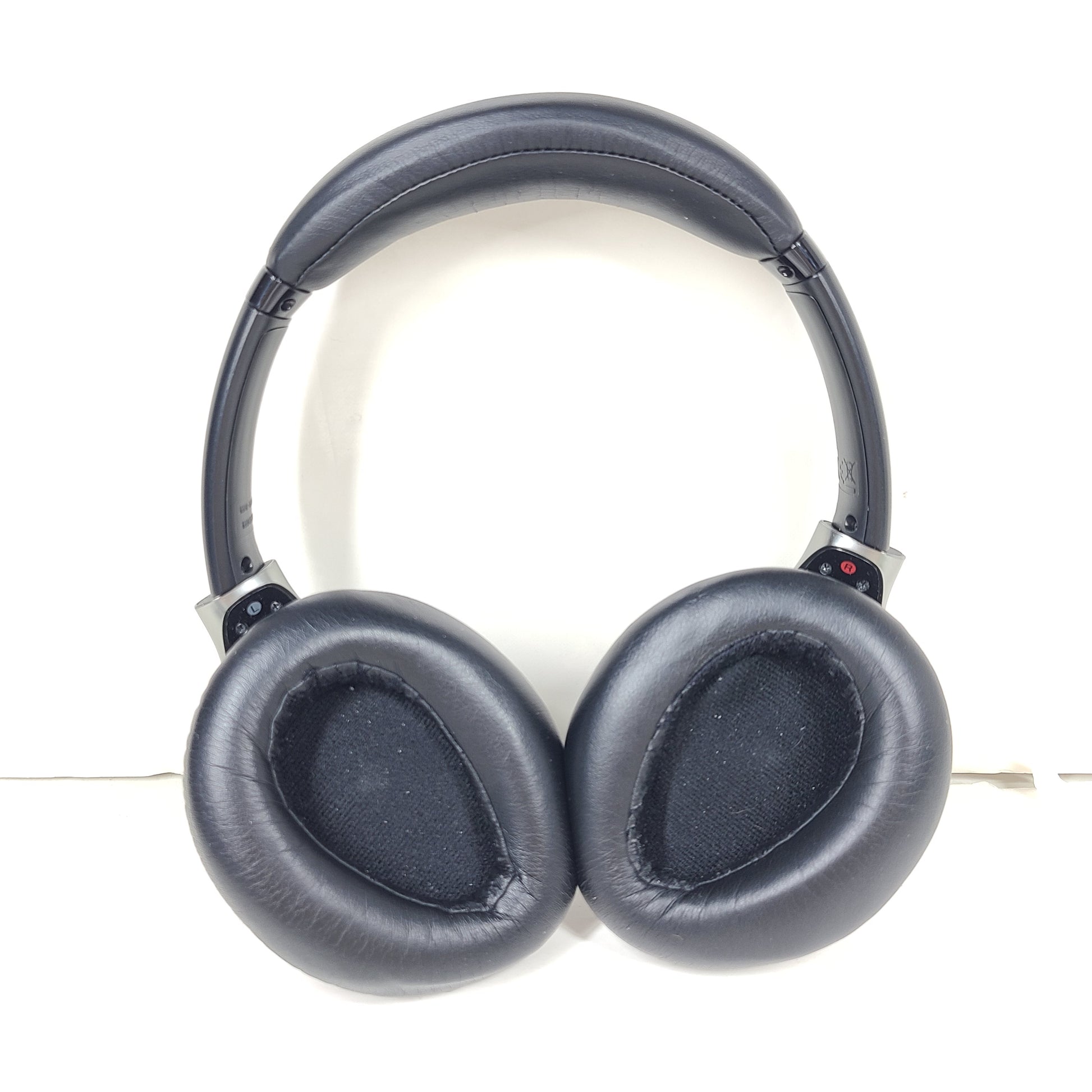 Black Sony MDR-10RNC on-ear noise-cancelling headphones with DIGITAL NC labeling and attached cable.