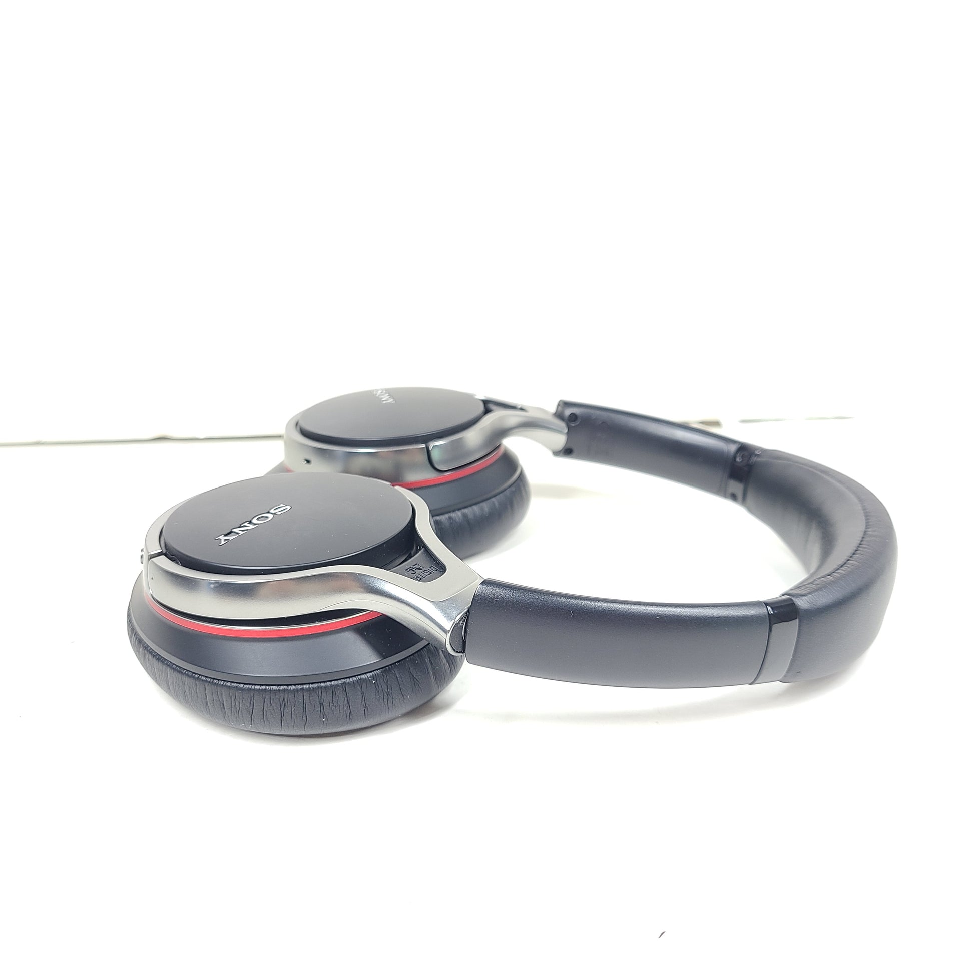 Black Sony MDR-10RNC on-ear noise-cancelling headphones with DIGITAL NC labeling and attached cable.