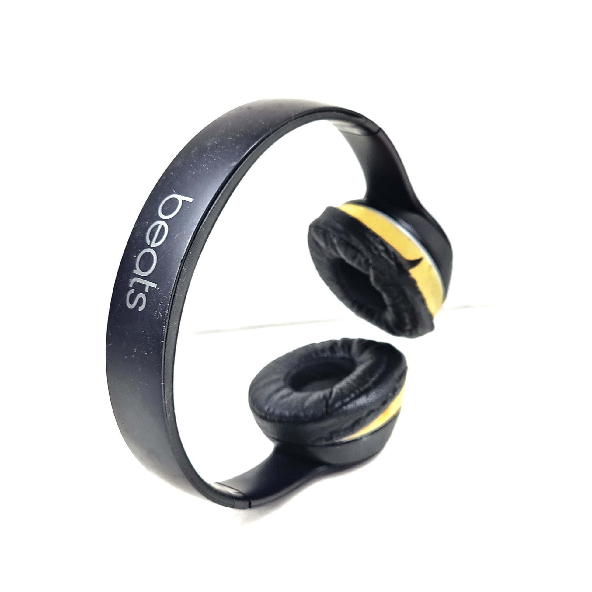 Black Beats Solo3 Wireless on-ear headphones with cushioned ear cups and adjustable headband.