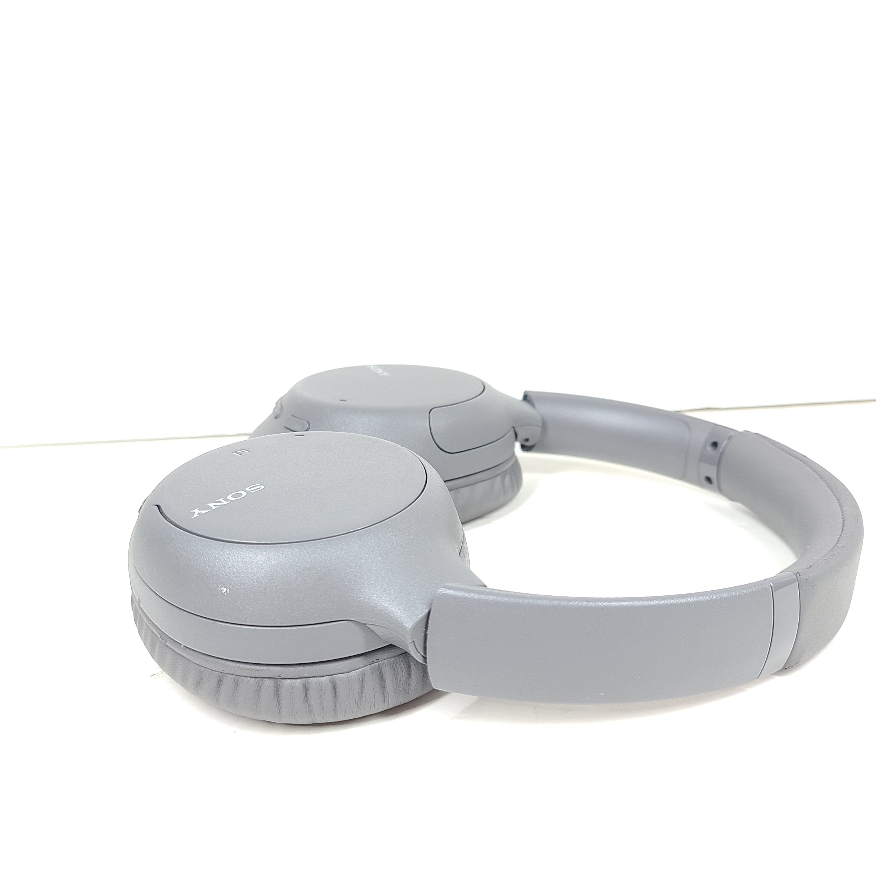 Sony WH-CH710N over-ear wireless headphones in gray with active noise cancellation and on-device controls.