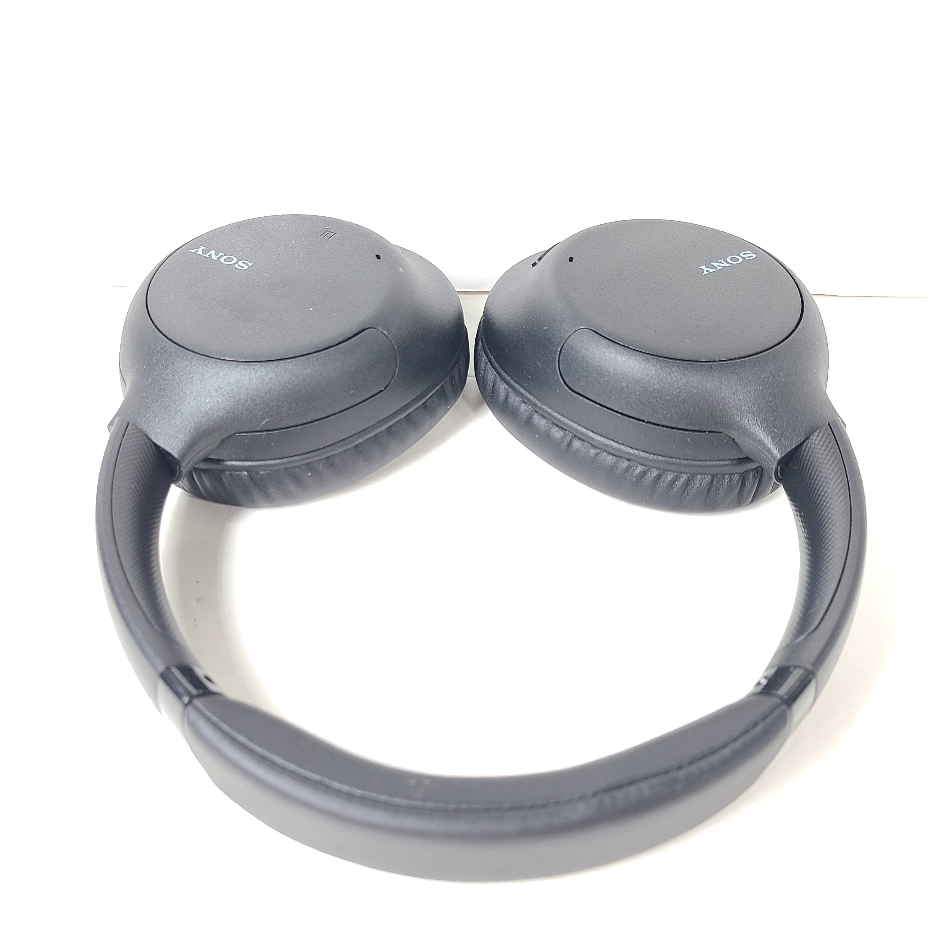 Black Sony WH-CH710N wireless over-ear headphones with active noise cancellation and cushioned earcups for extended comfort.