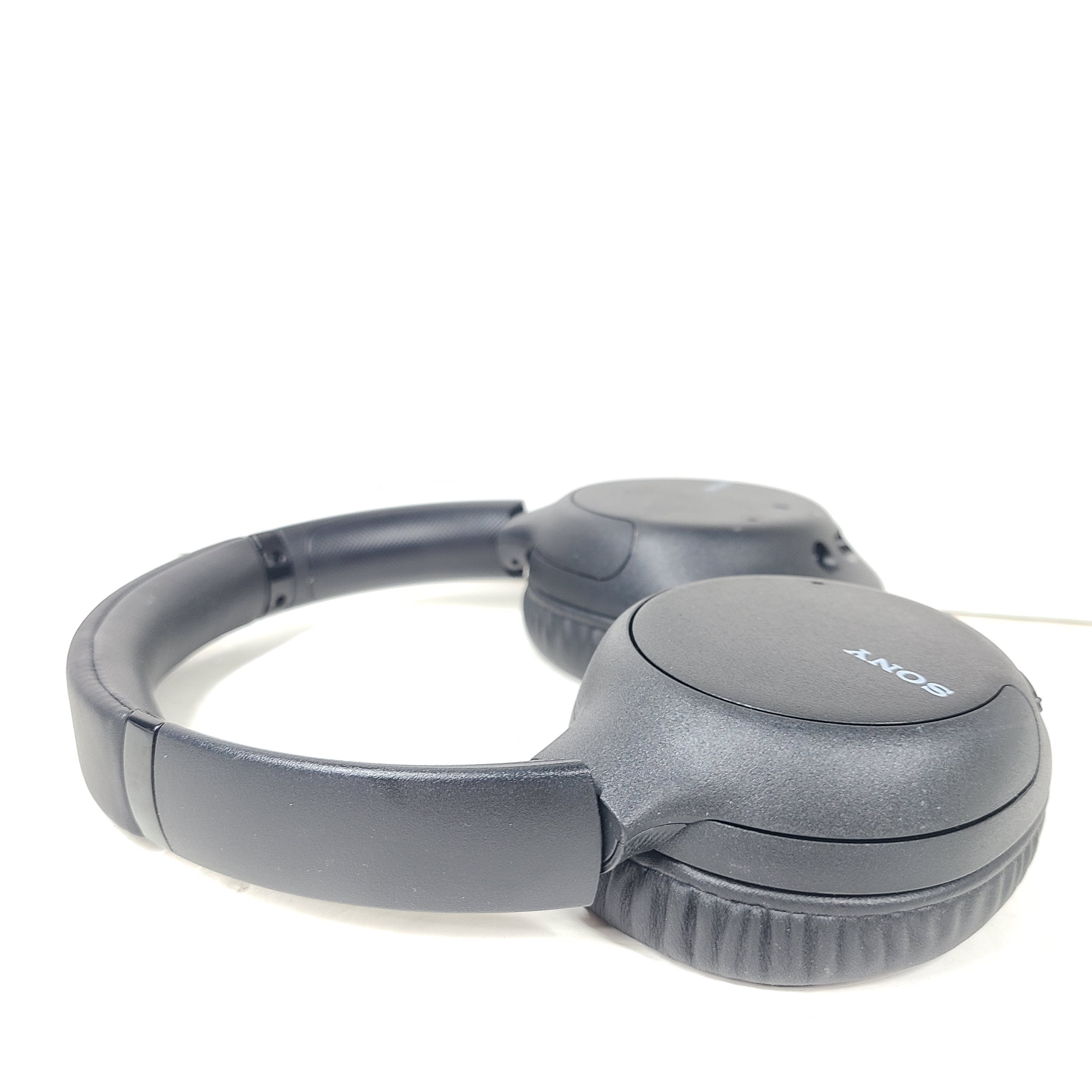Black Sony WH-CH710N wireless over-ear headphones with active noise cancellation and cushioned earcups for extended comfort.