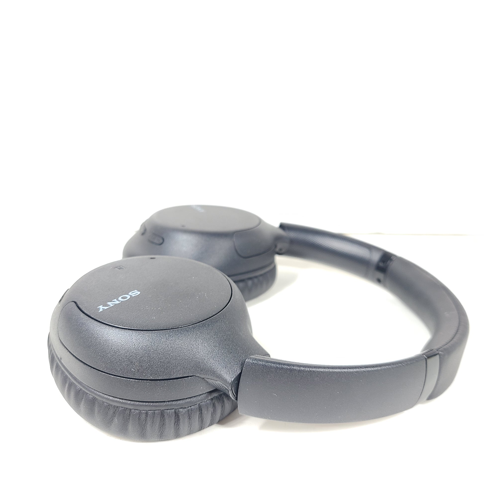 Black Sony WH-CH710N wireless over-ear headphones with active noise cancellation and cushioned earcups for extended comfort.