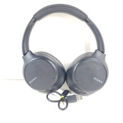 Black Sony WH-CH710N wireless noise-cancelling over-ear headset with USB charging support and comfortable ear cushions.