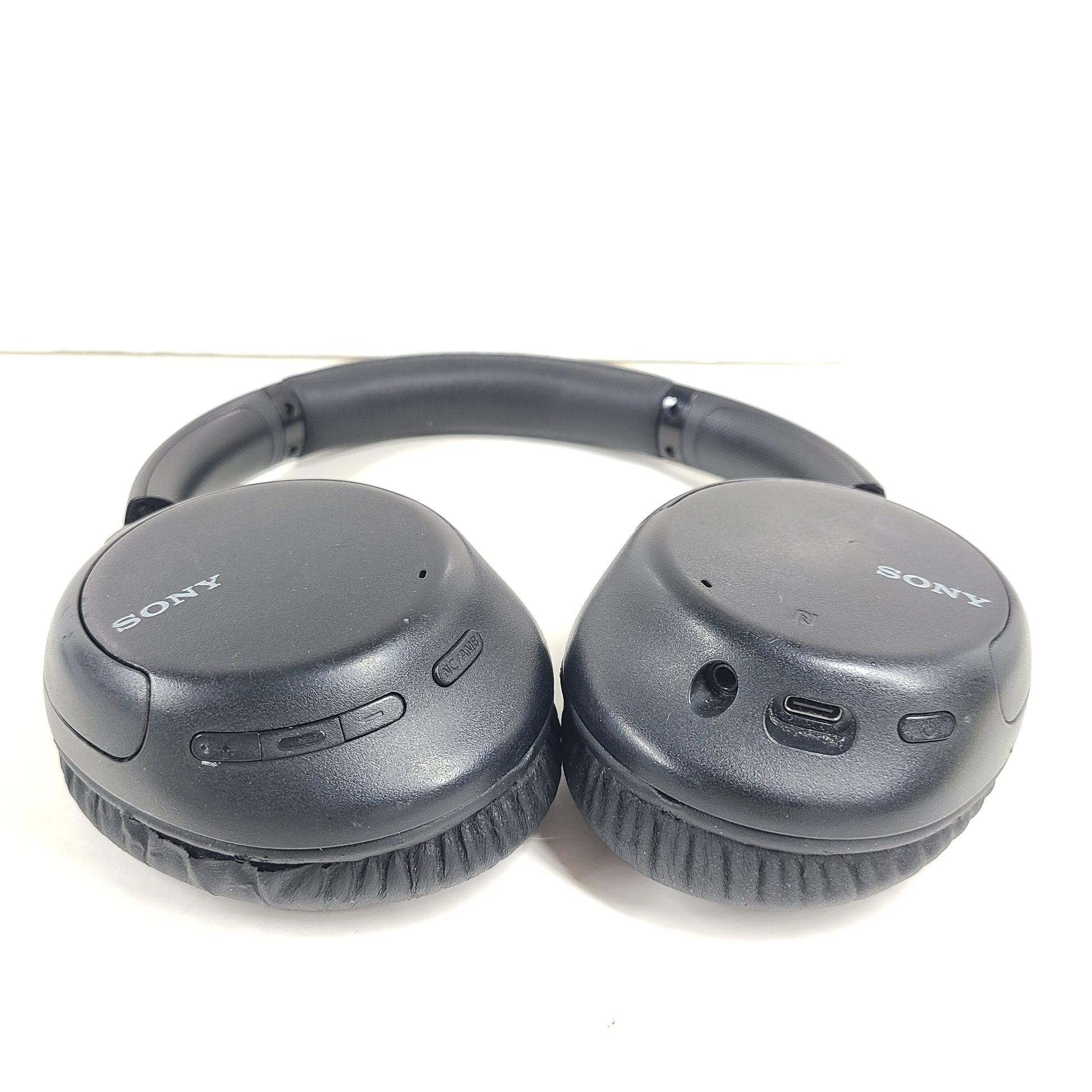 Black Sony WH-CH710N wireless noise-cancelling over-ear headset with USB charging support and comfortable ear cushions.