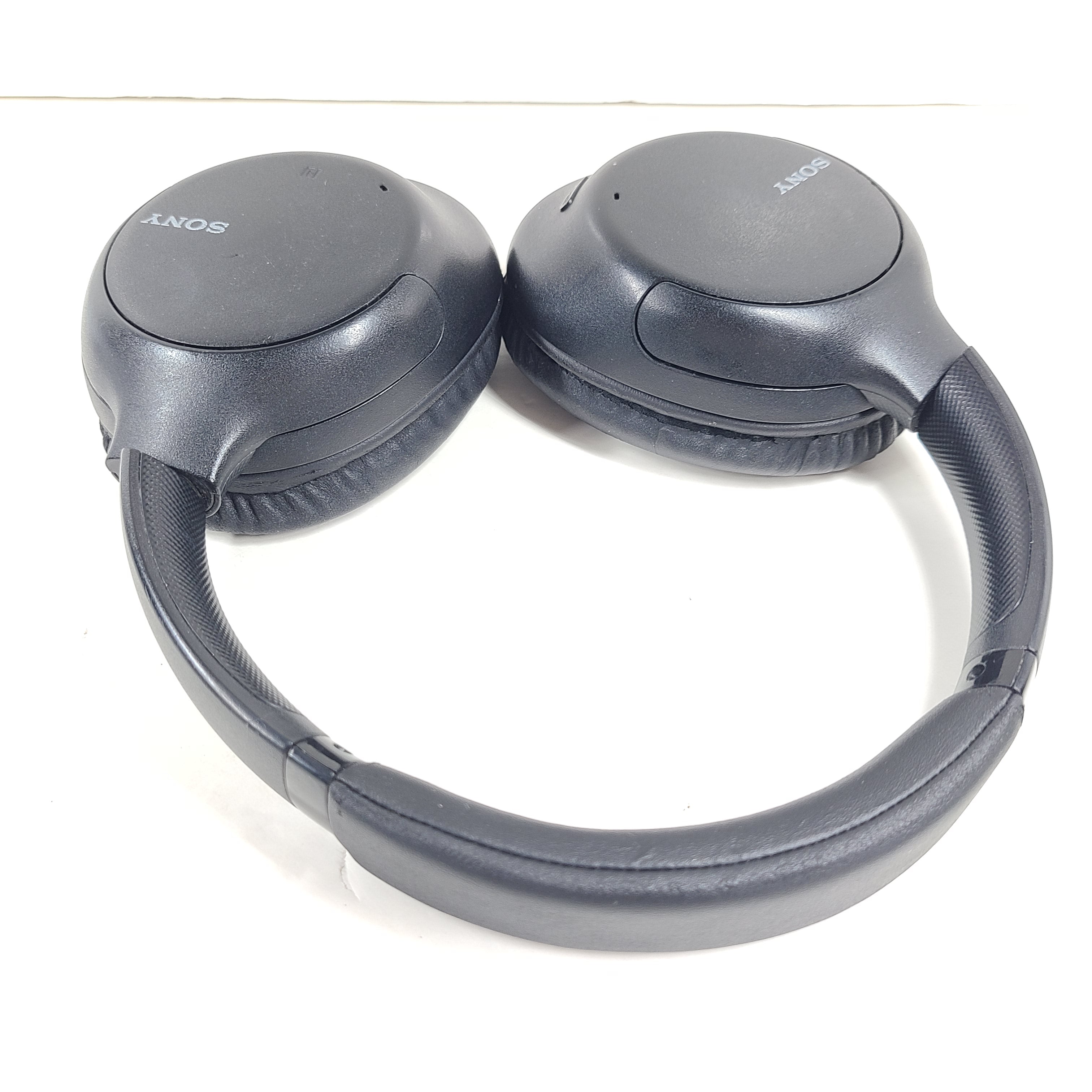 Black Sony WH-CH710N wireless noise-cancelling over-ear headset with USB charging support and comfortable ear cushions.