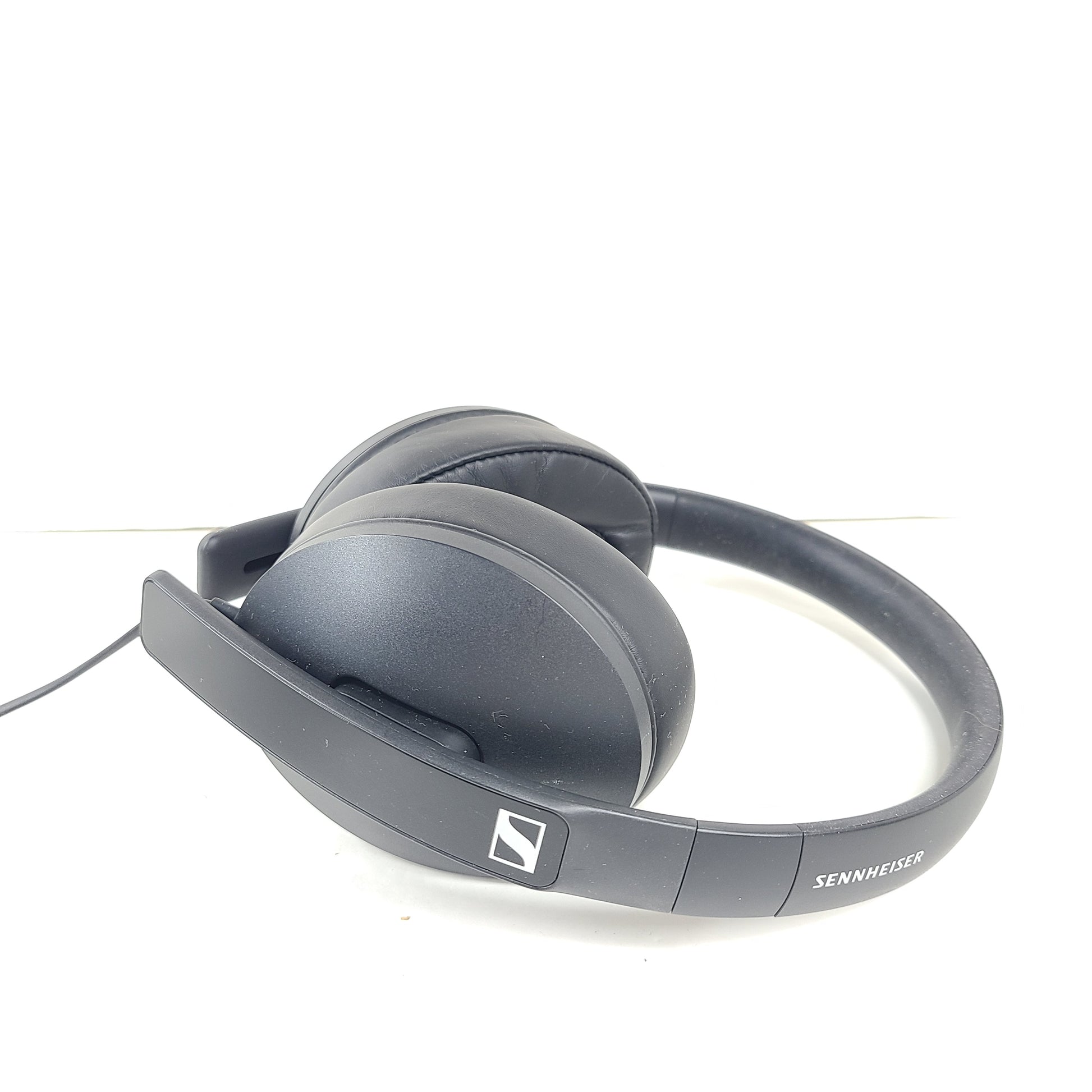 Black Sennheiser HD 400S wired over-ear headphones with adjustable headband and cushioned earcups.