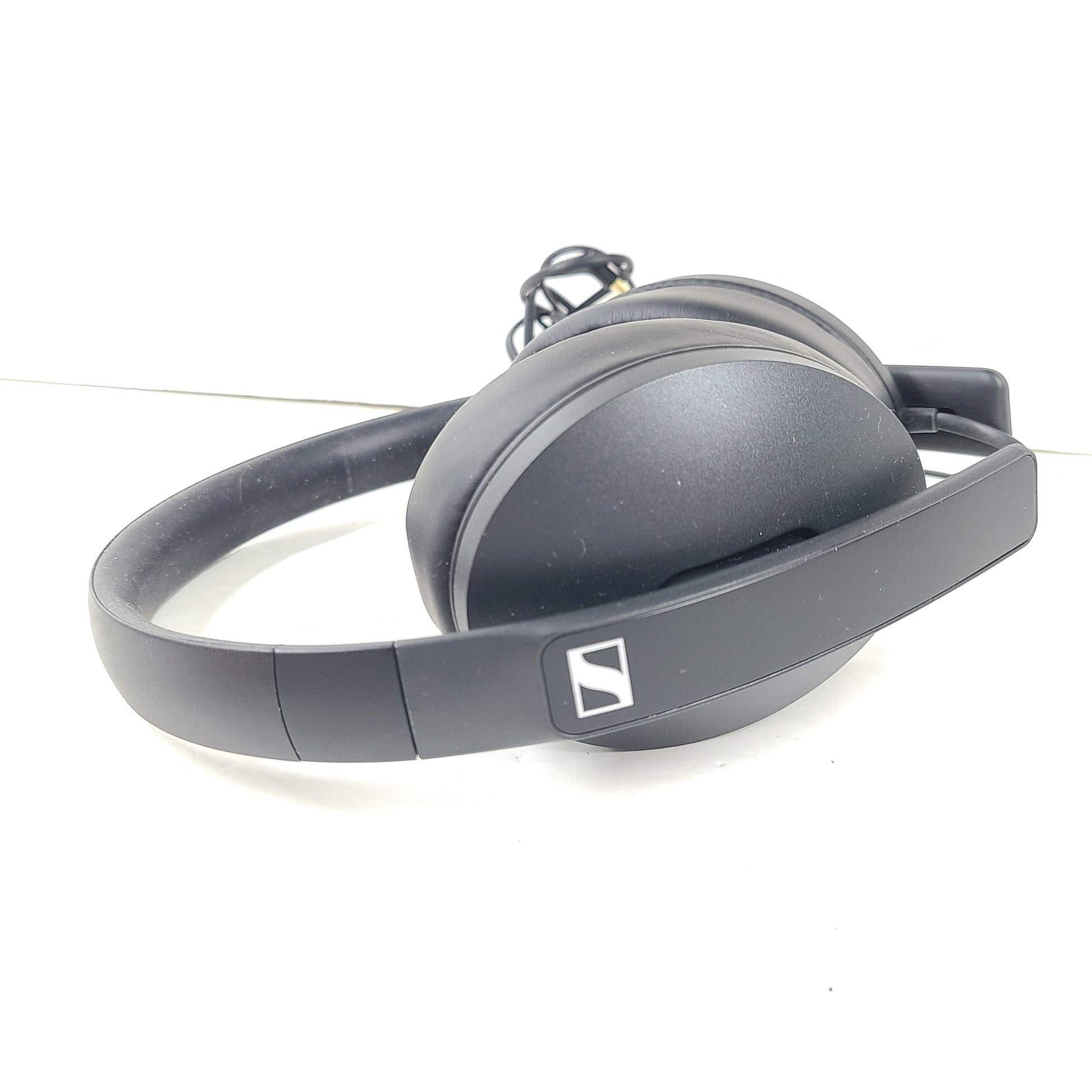 Black Sennheiser HD 400S wired over-ear headphones with adjustable headband and cushioned earcups.