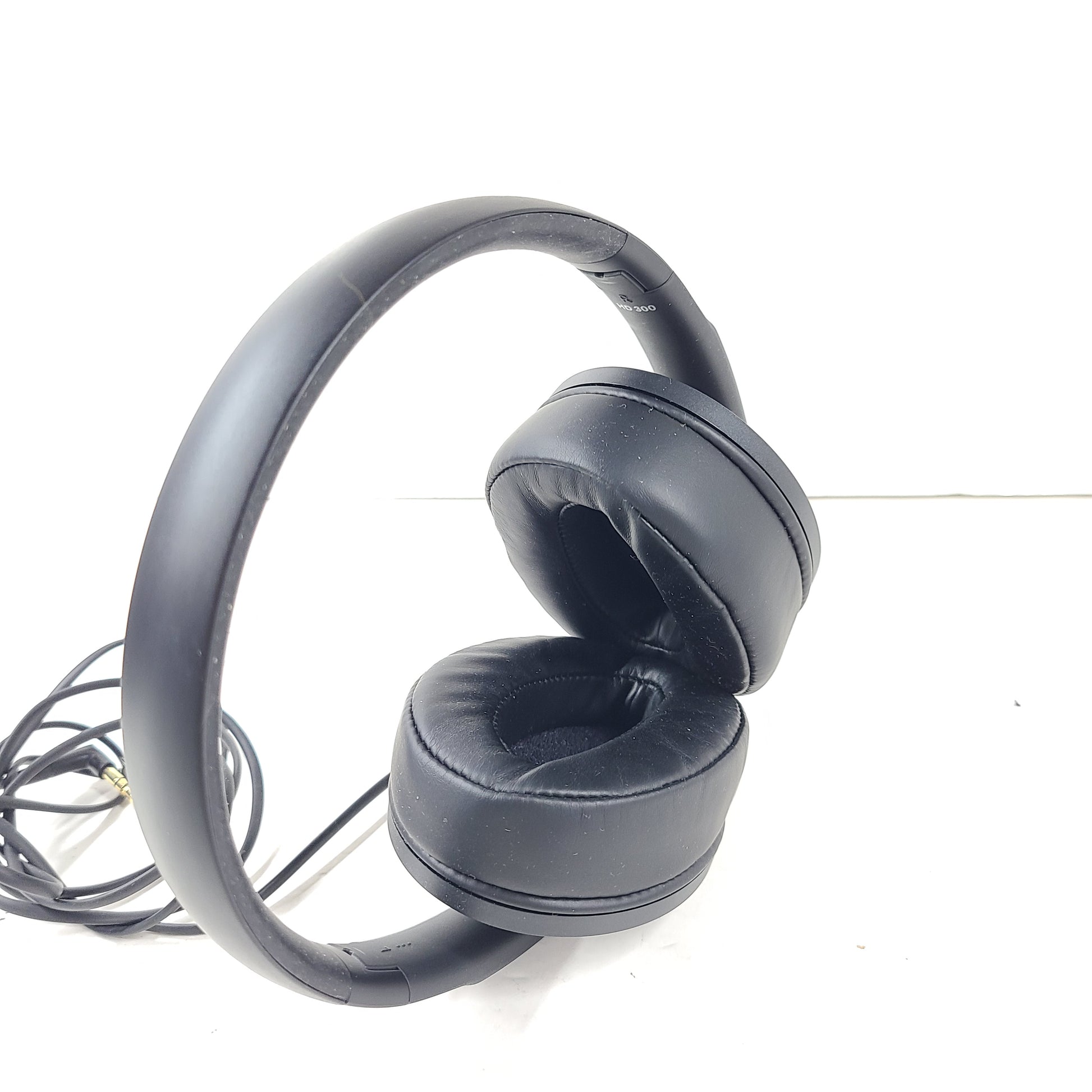 Black Sennheiser HD 400S wired over-ear headphones with adjustable headband and cushioned earcups.