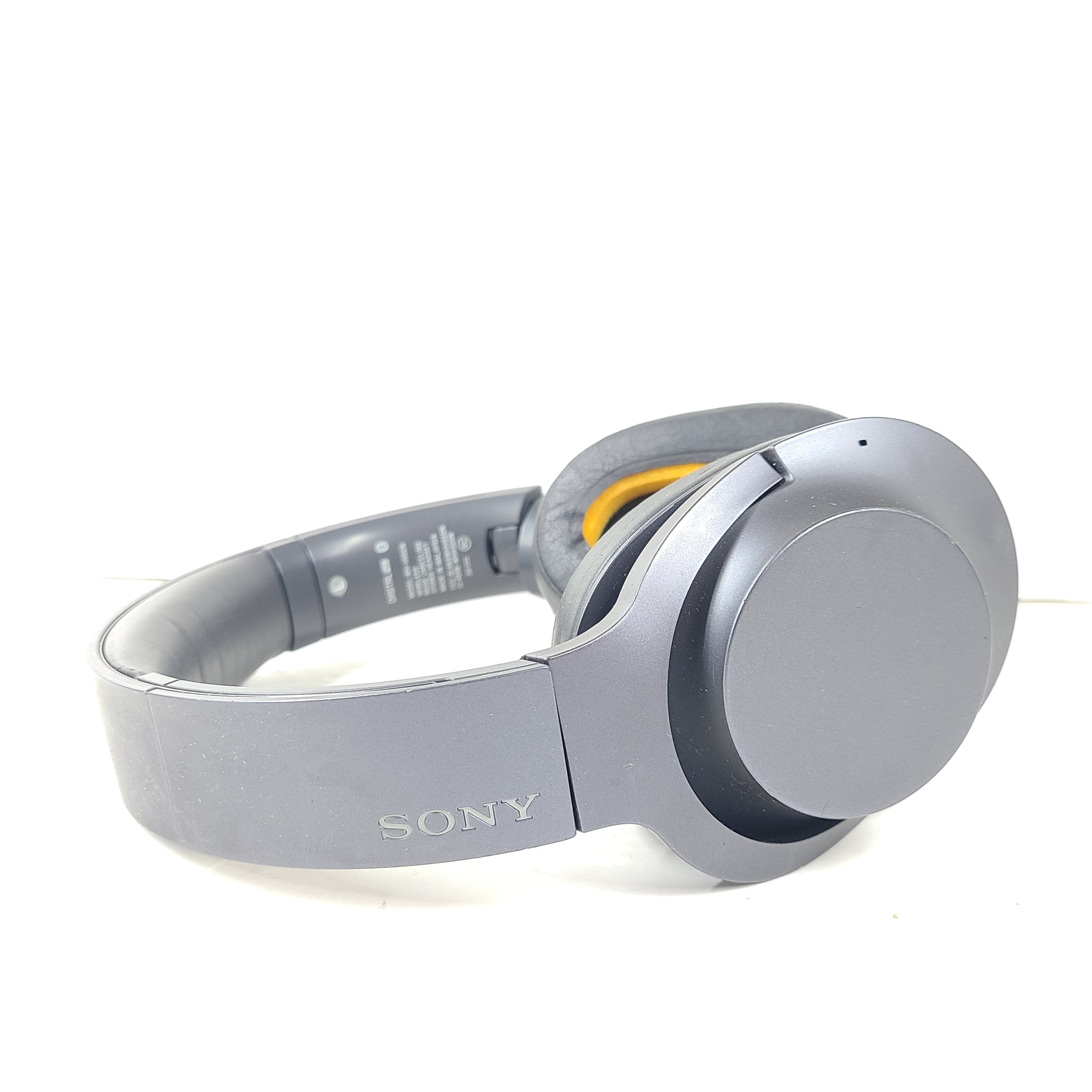 Over-ear Sony WH-H900N wireless headphones in gray with active noise cancellation and Bluetooth connectivity.