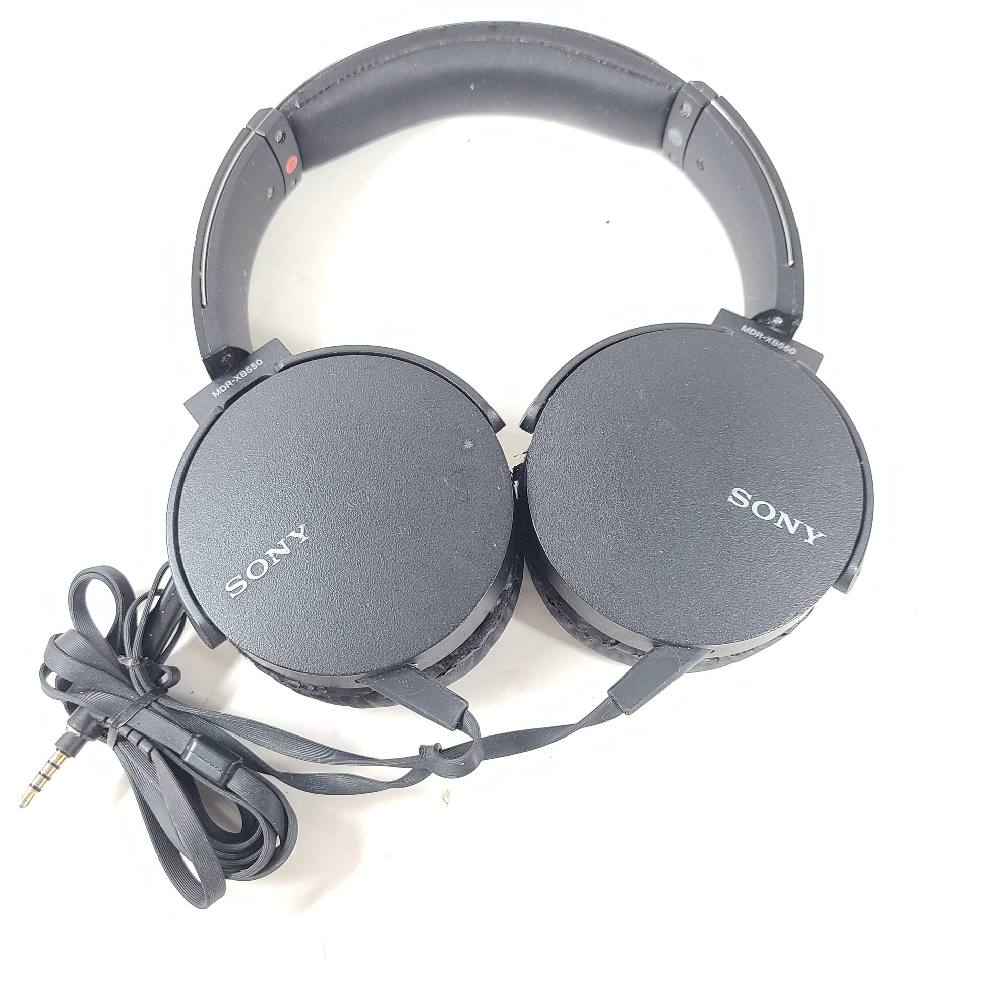 Sony MDR-XB550 wired on-ear headphones in black with cushioned headband and attached audio cable.
