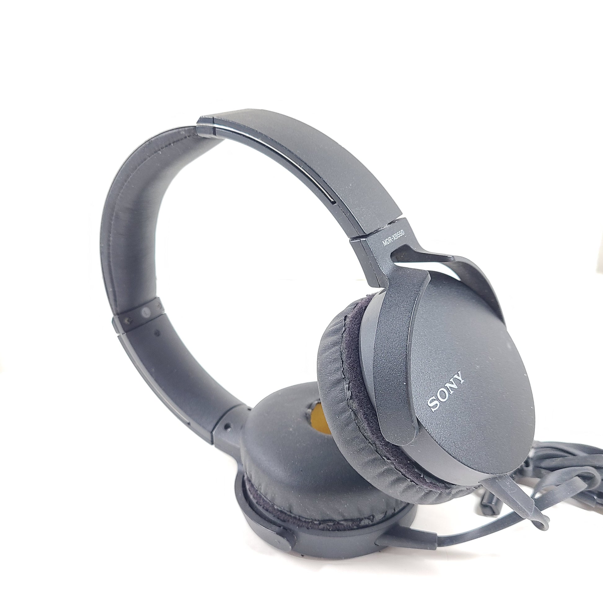 Sony MDR-XB550 wired on-ear headphones in black with cushioned headband and attached audio cable.