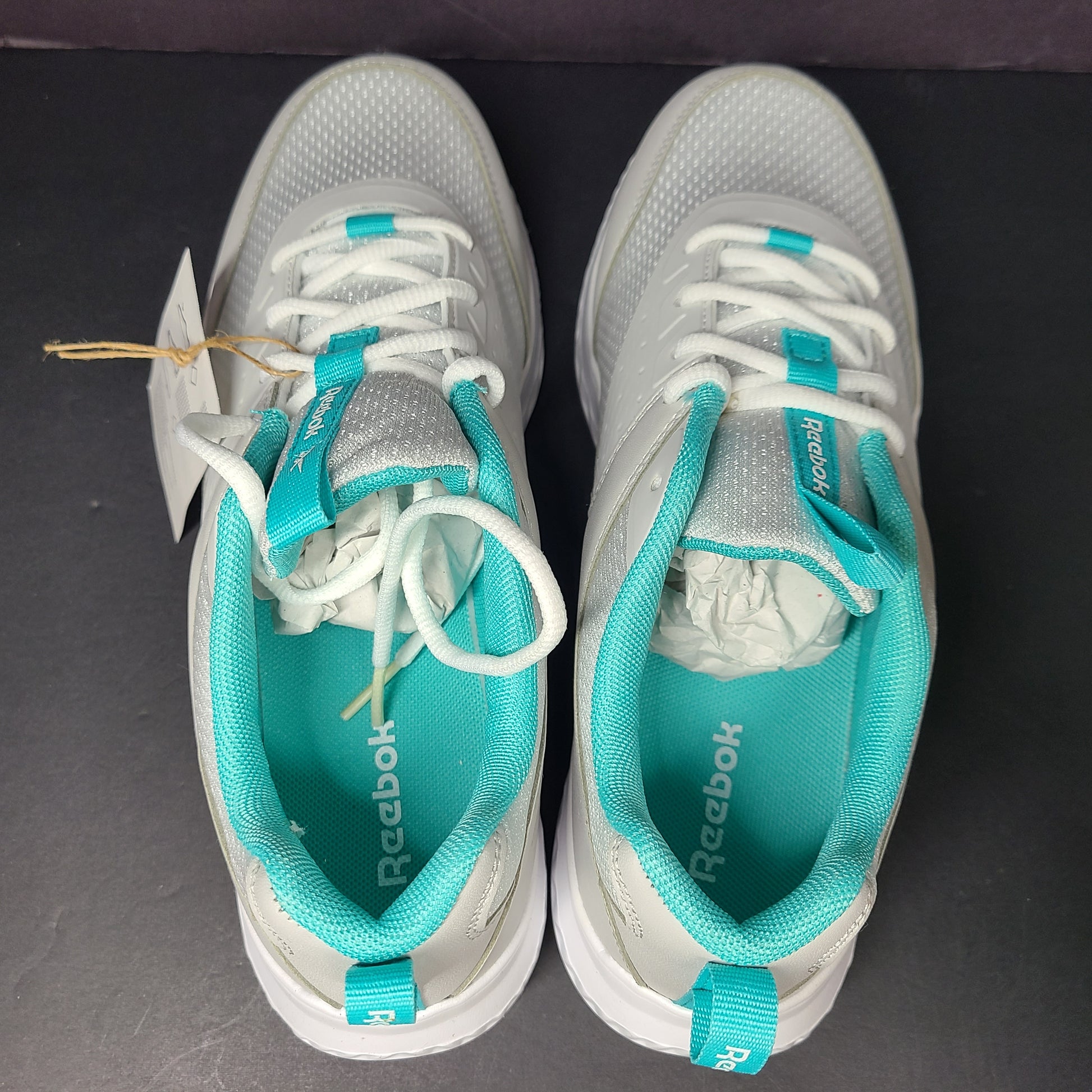 New Reebok Rush Runner 4.0 in white and teal, two pairs in US sizes 5.5 and 7.