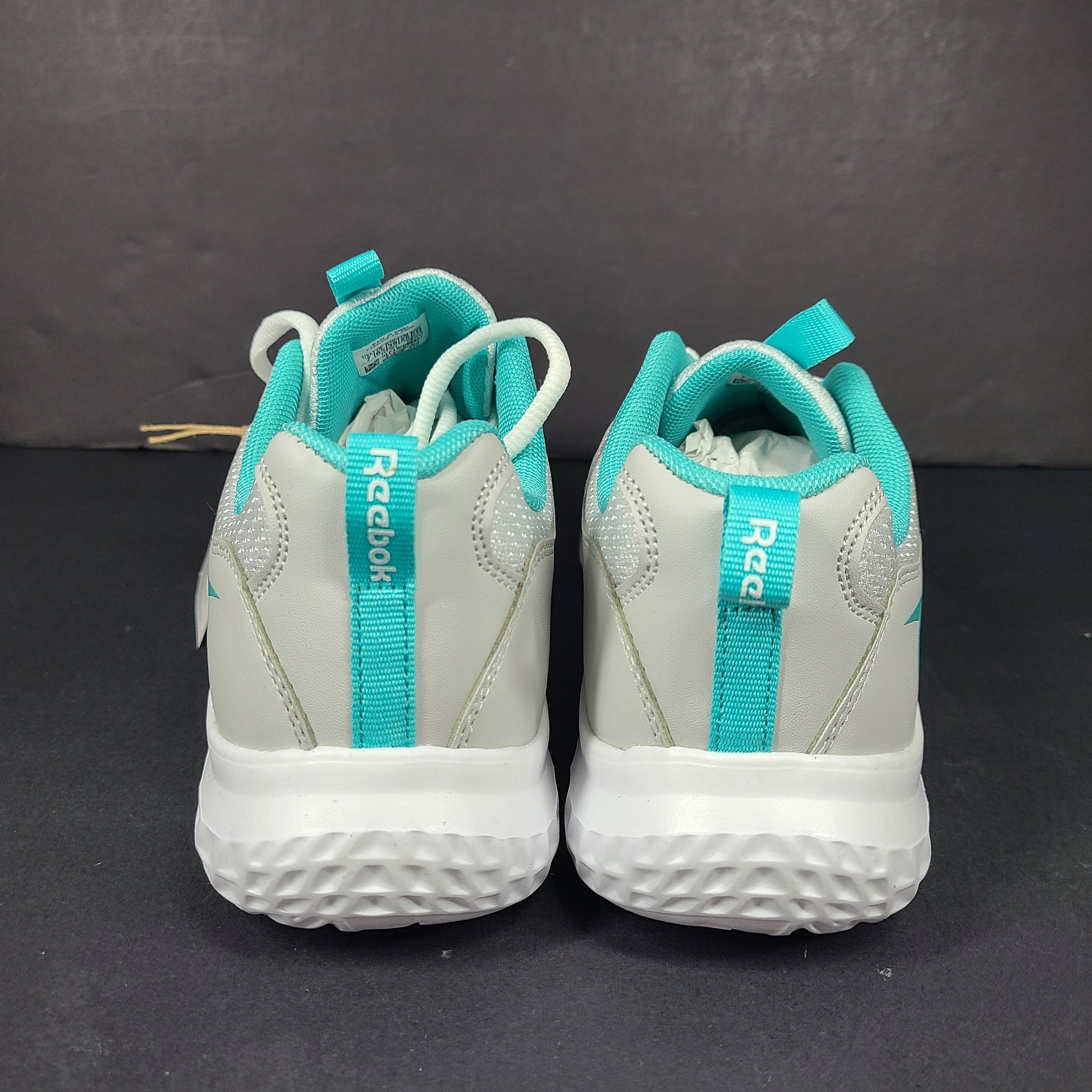 New Reebok Rush Runner 4.0 in white and teal, two pairs in US sizes 5.5 and 7.