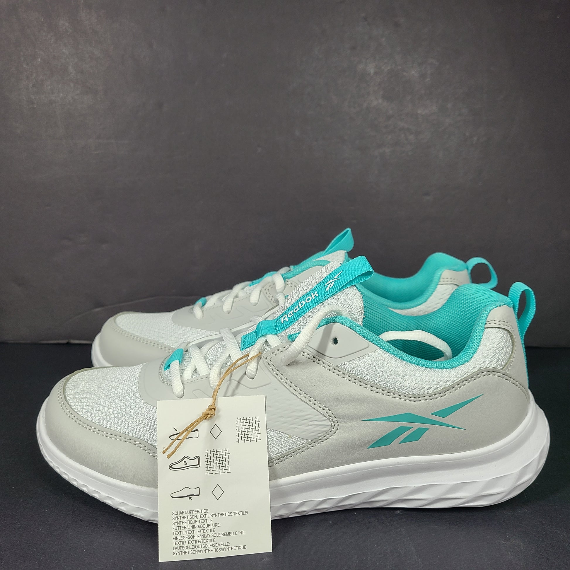 New Reebok Rush Runner 4.0 in white and teal, two pairs in US sizes 5.5 and 7.