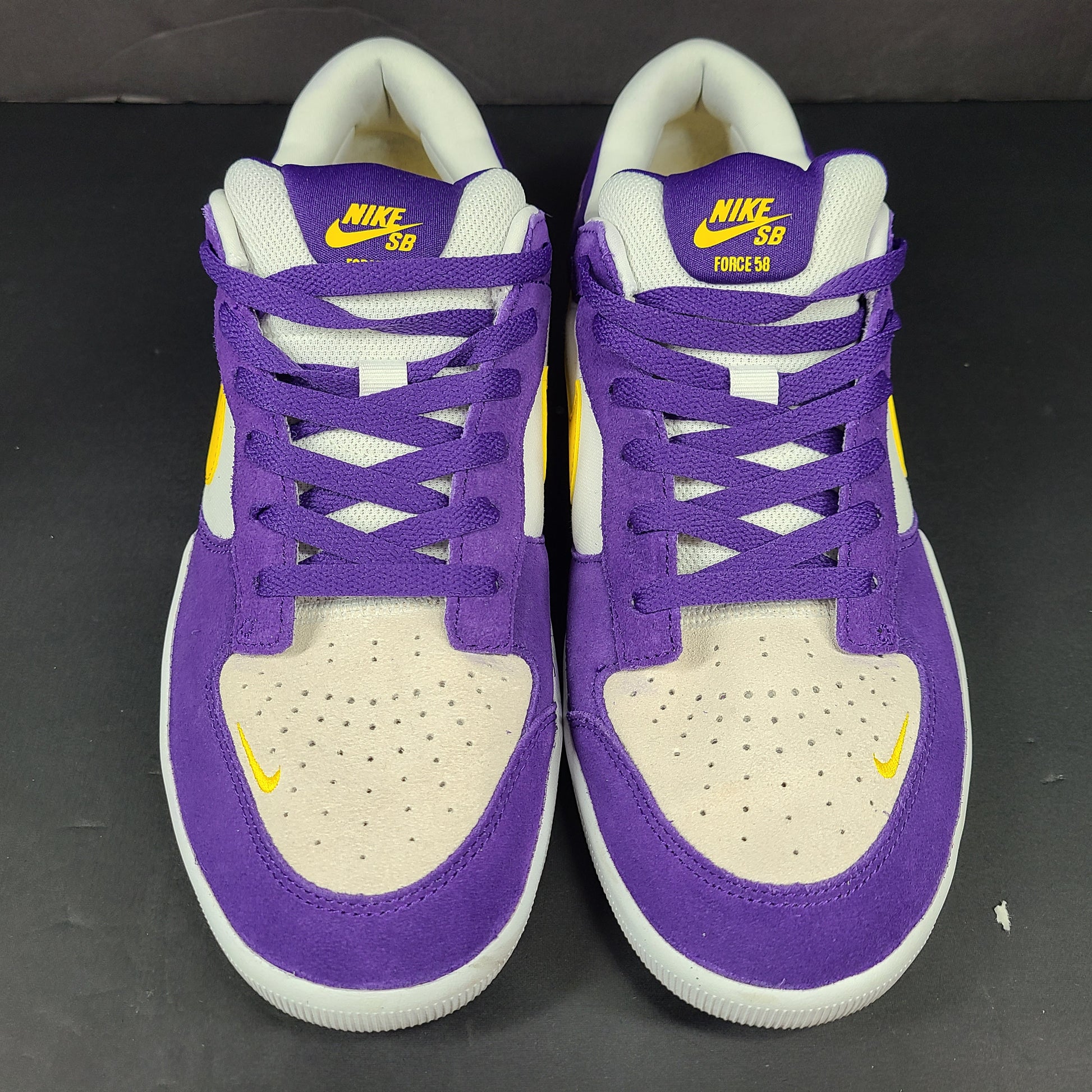 Nike SB Force 58 in purple, yellow and white offers a durable canvas-and-suede skate silhouette with responsive support and grip.