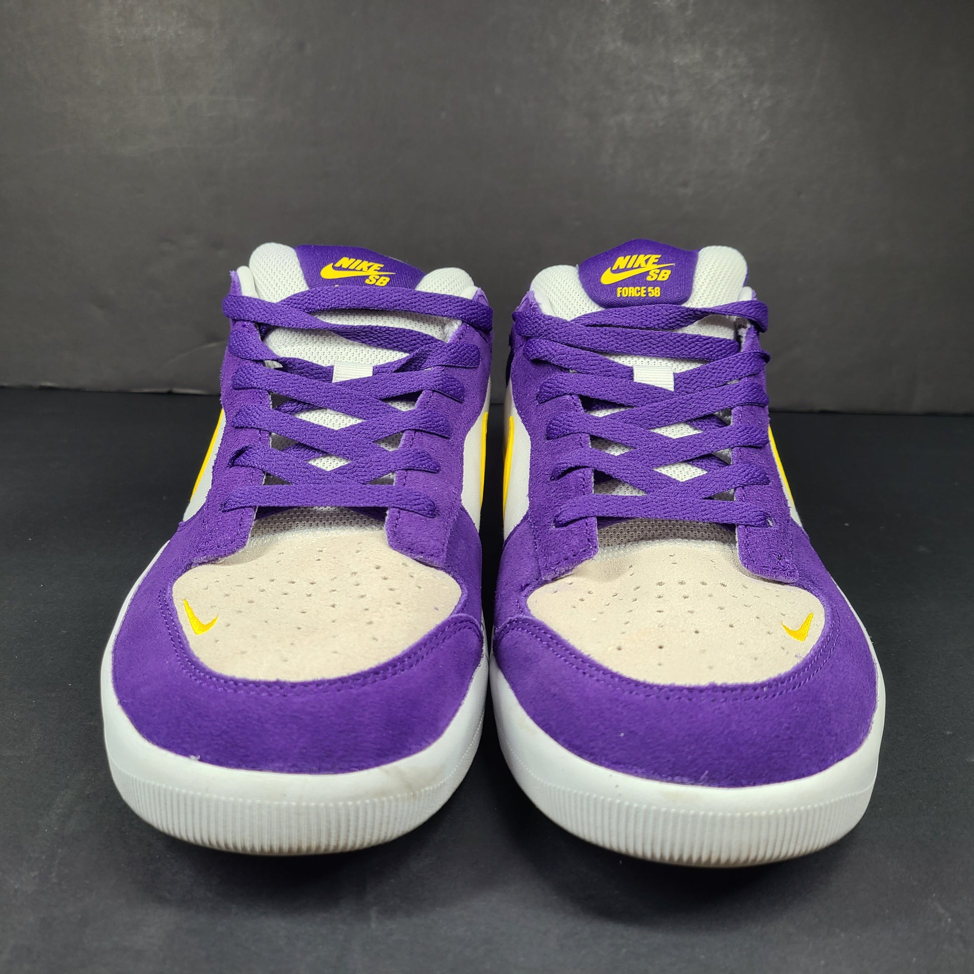 Nike SB Force 58 in purple, yellow and white offers a durable canvas-and-suede skate silhouette with responsive support and grip.