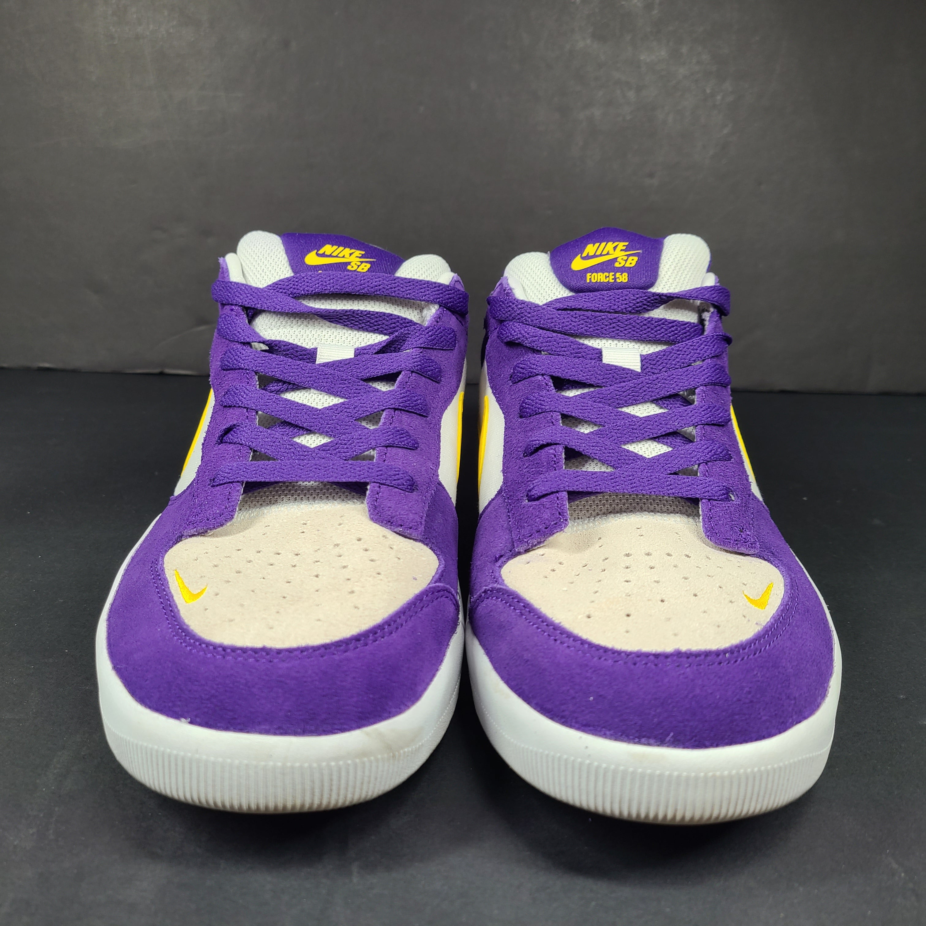 Nike SB Force 58 in purple, yellow and white offers a durable canvas-and-suede skate silhouette with responsive support and grip.