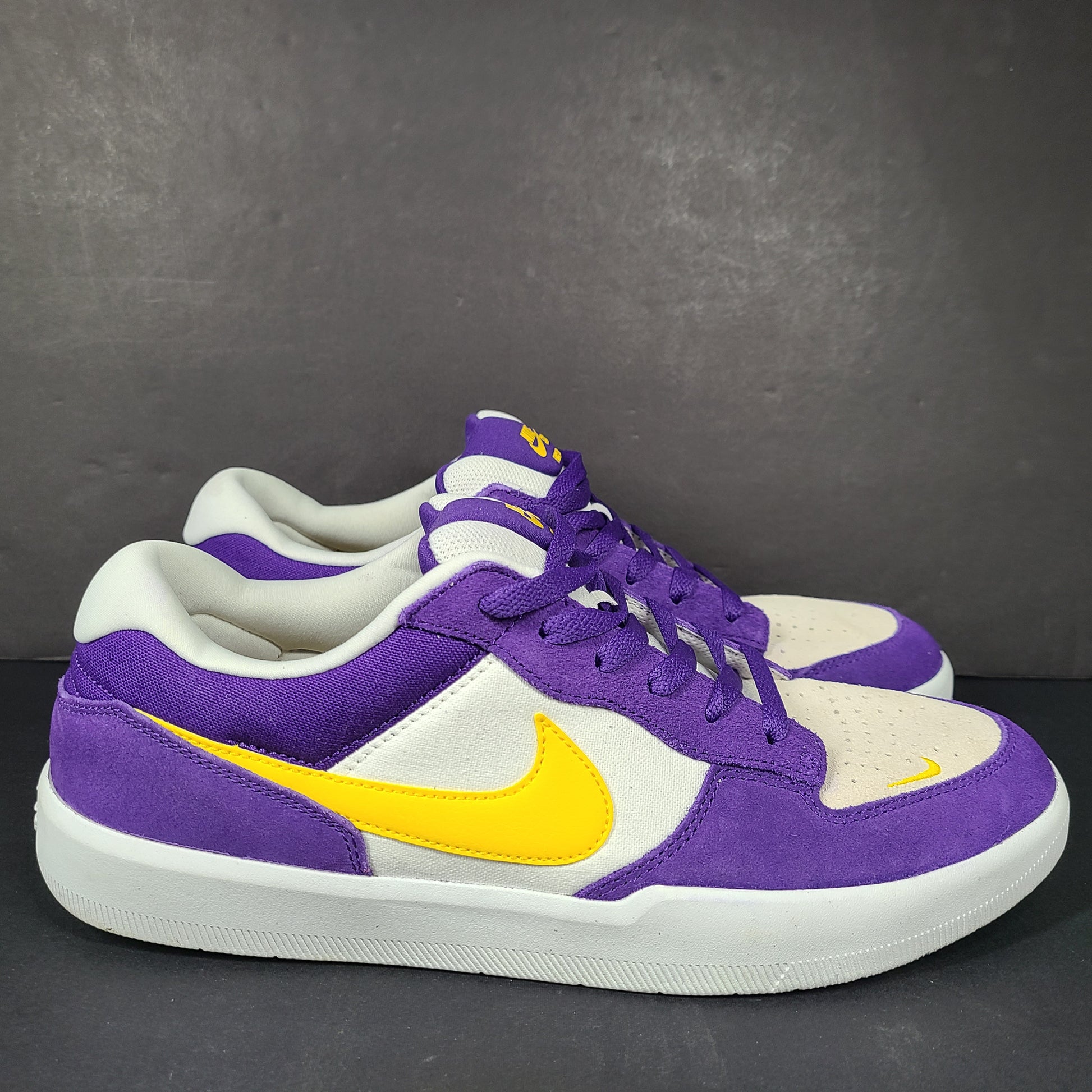 Nike SB Force 58 in purple, yellow and white offers a durable canvas-and-suede skate silhouette with responsive support and grip.