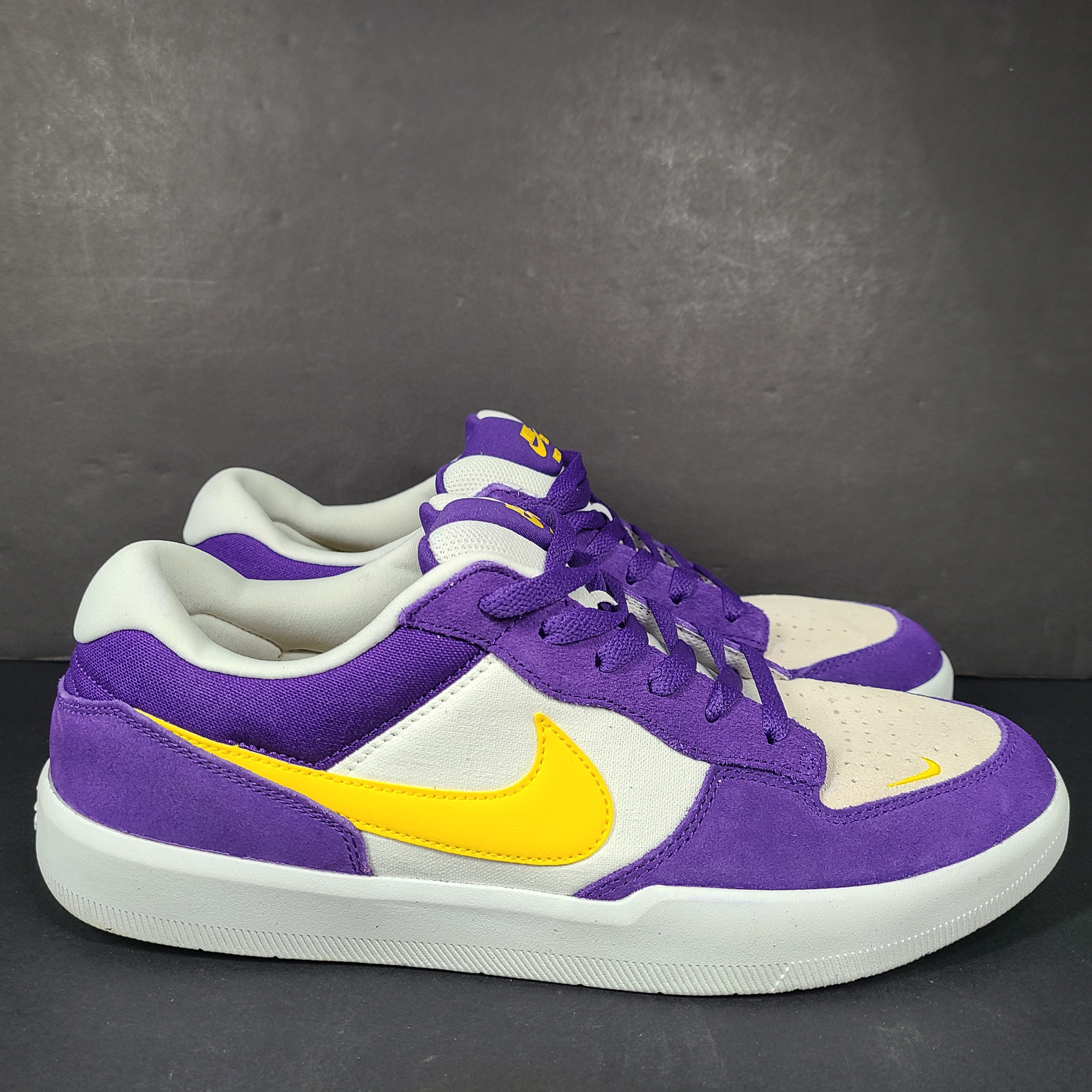 Nike SB Force 58 in purple, yellow and white offers a durable canvas-and-suede skate silhouette with responsive support and grip.