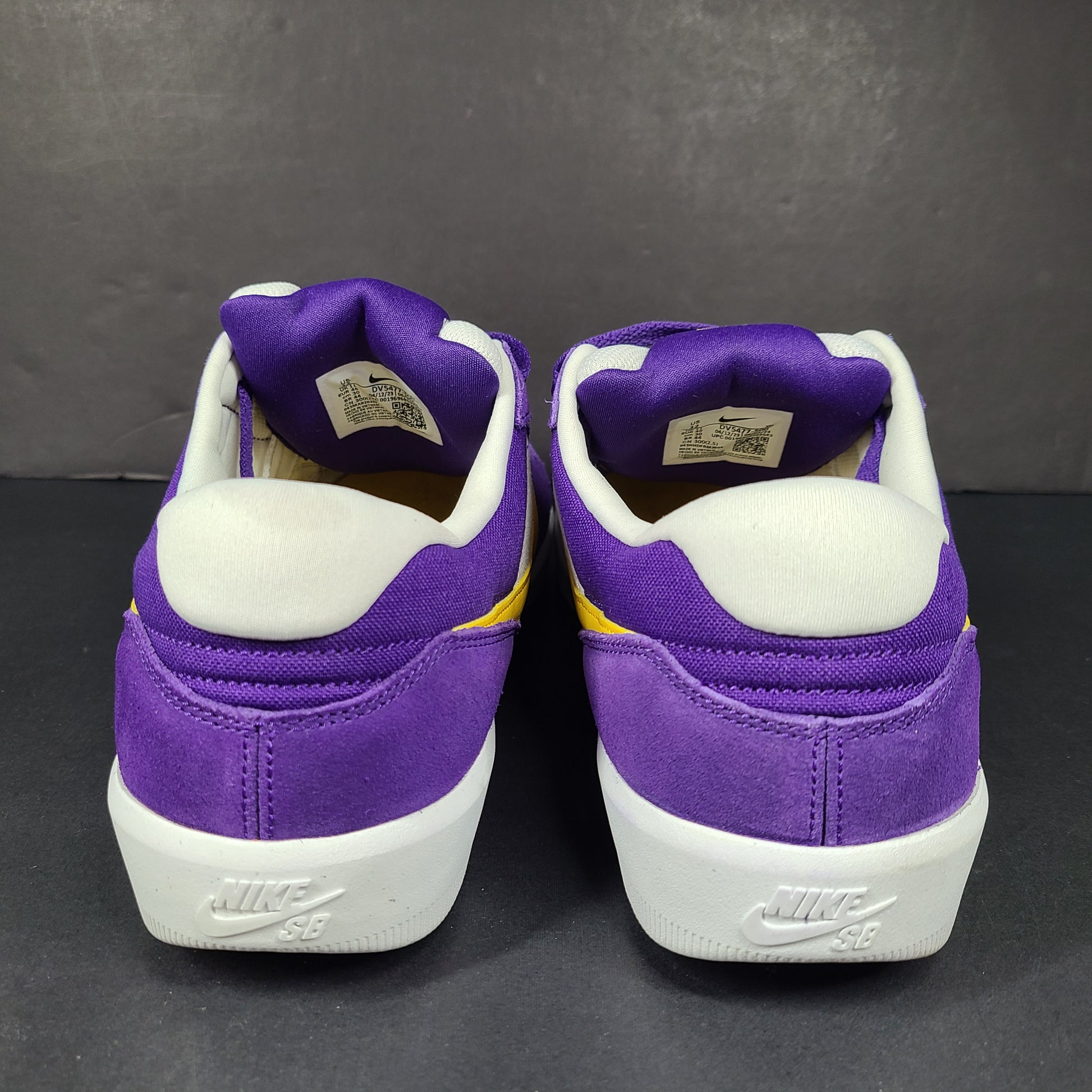 Nike SB Force 58 in purple, yellow and white offers a durable canvas-and-suede skate silhouette with responsive support and grip.