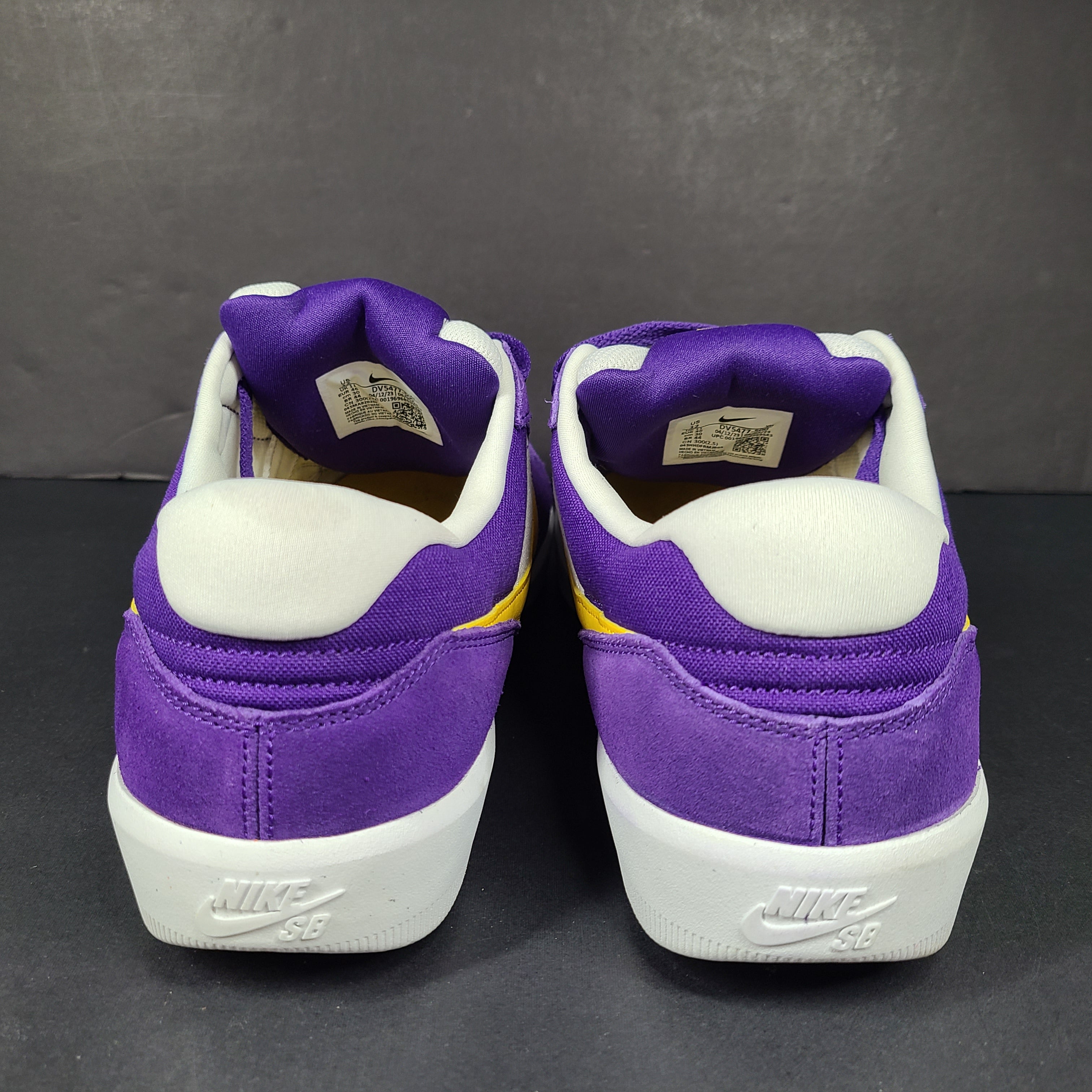 Nike SB Force 58 in purple, yellow and white offers a durable canvas-and-suede skate silhouette with responsive support and grip.