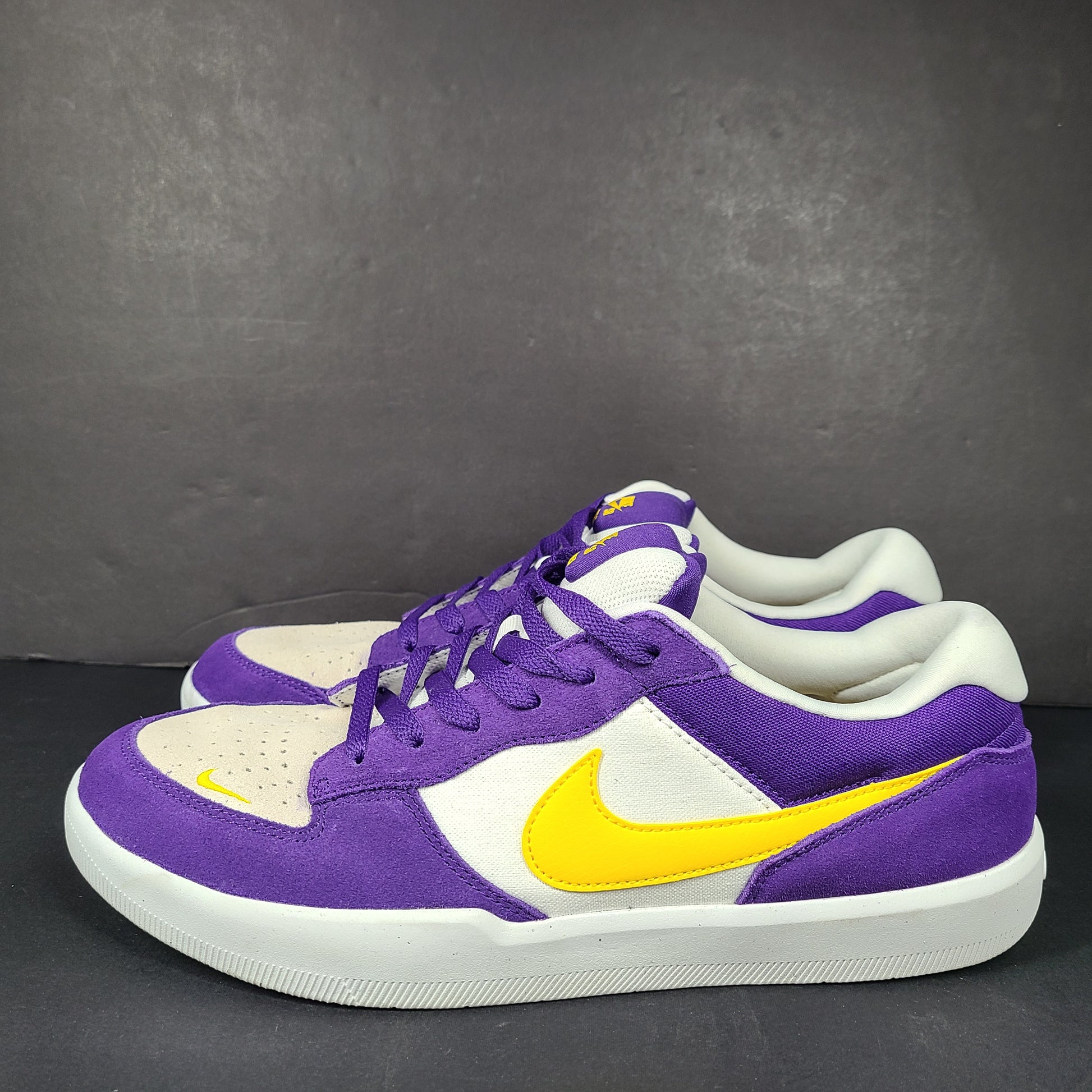 Nike SB Force 58 in purple, yellow and white offers a durable canvas-and-suede skate silhouette with responsive support and grip.