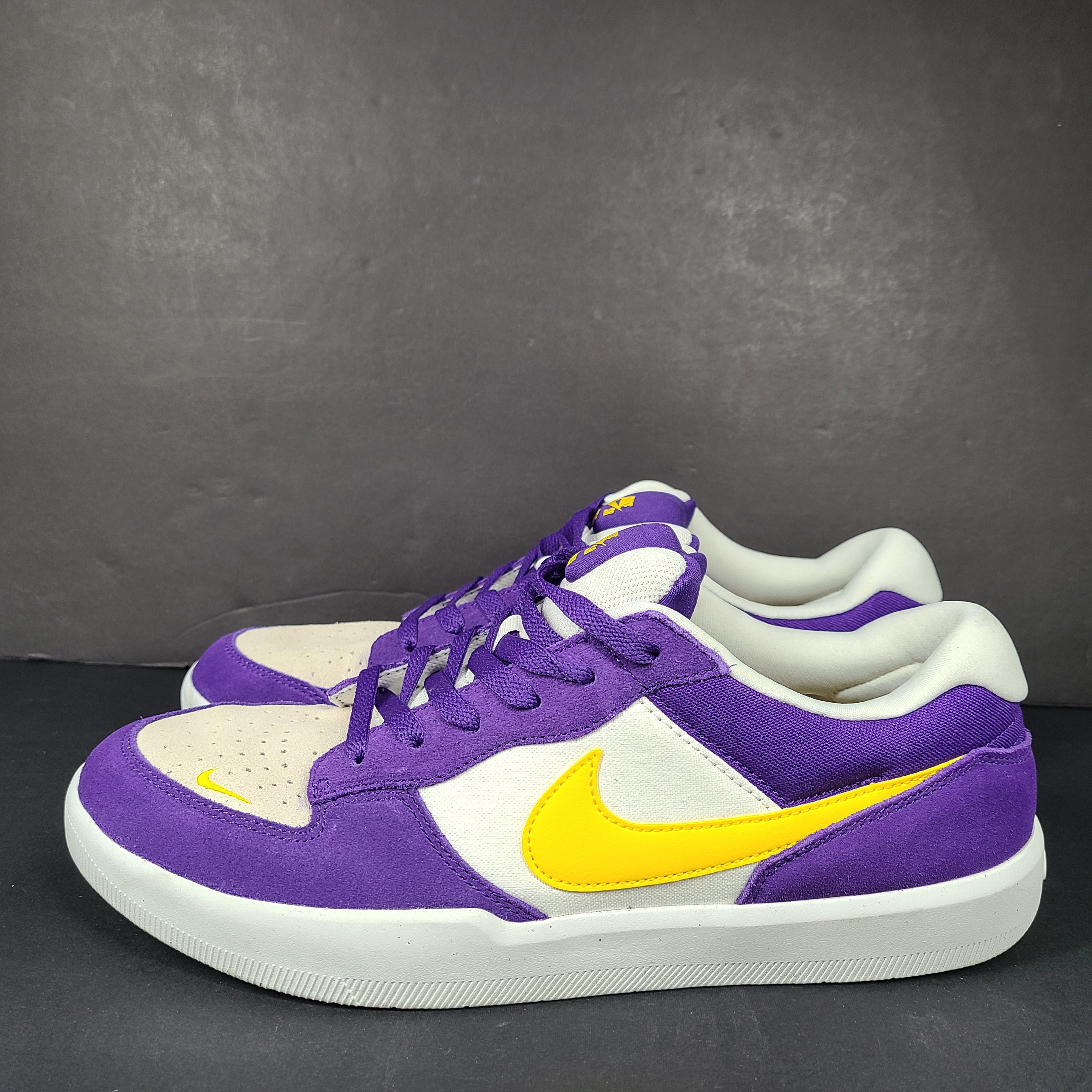 Nike SB Force 58 in purple, yellow and white offers a durable canvas-and-suede skate silhouette with responsive support and grip.