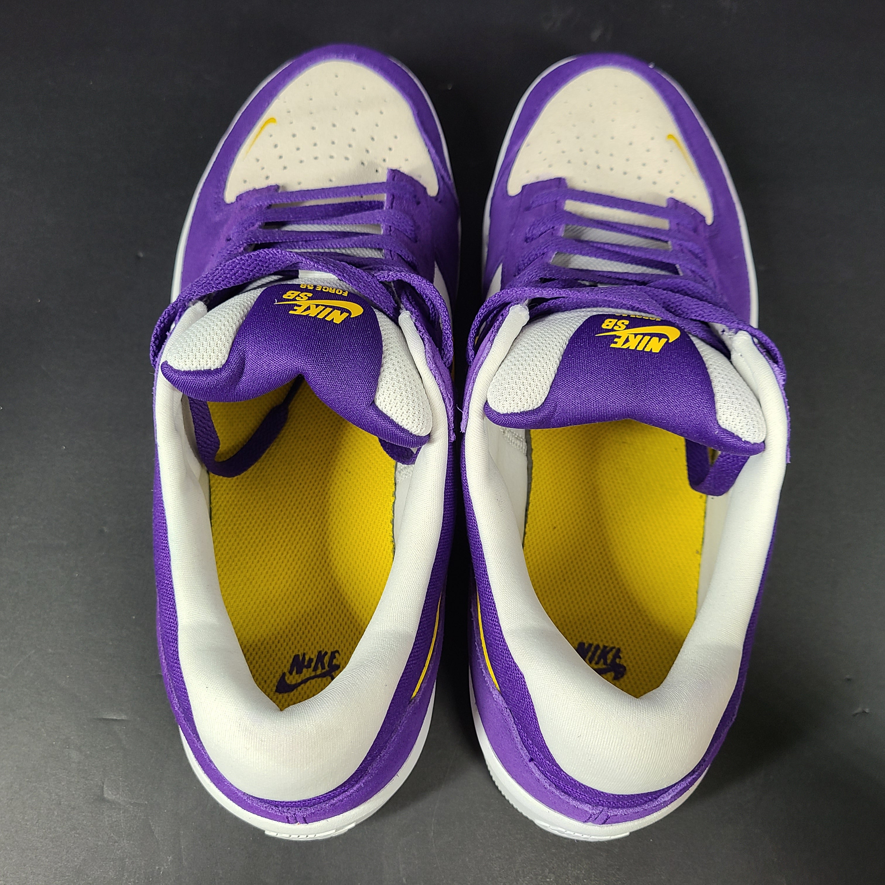 Nike SB Force 58 in purple, yellow and white offers a durable canvas-and-suede skate silhouette with responsive support and grip.