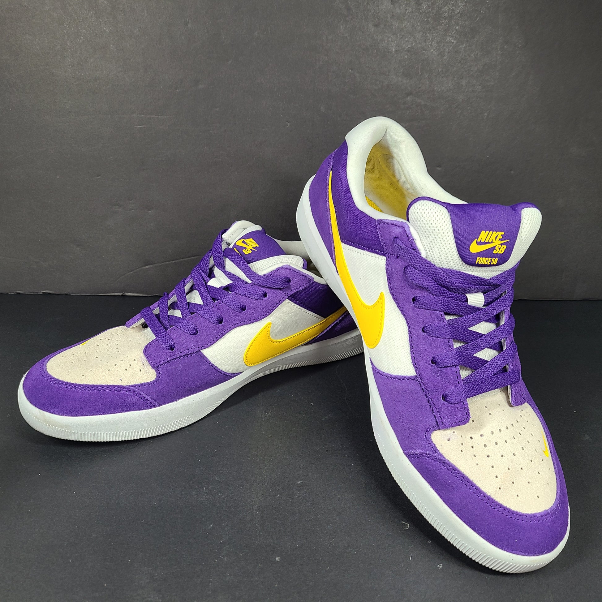 Nike SB Force 58 in purple, yellow and white offers a durable canvas-and-suede skate silhouette with responsive support and grip.