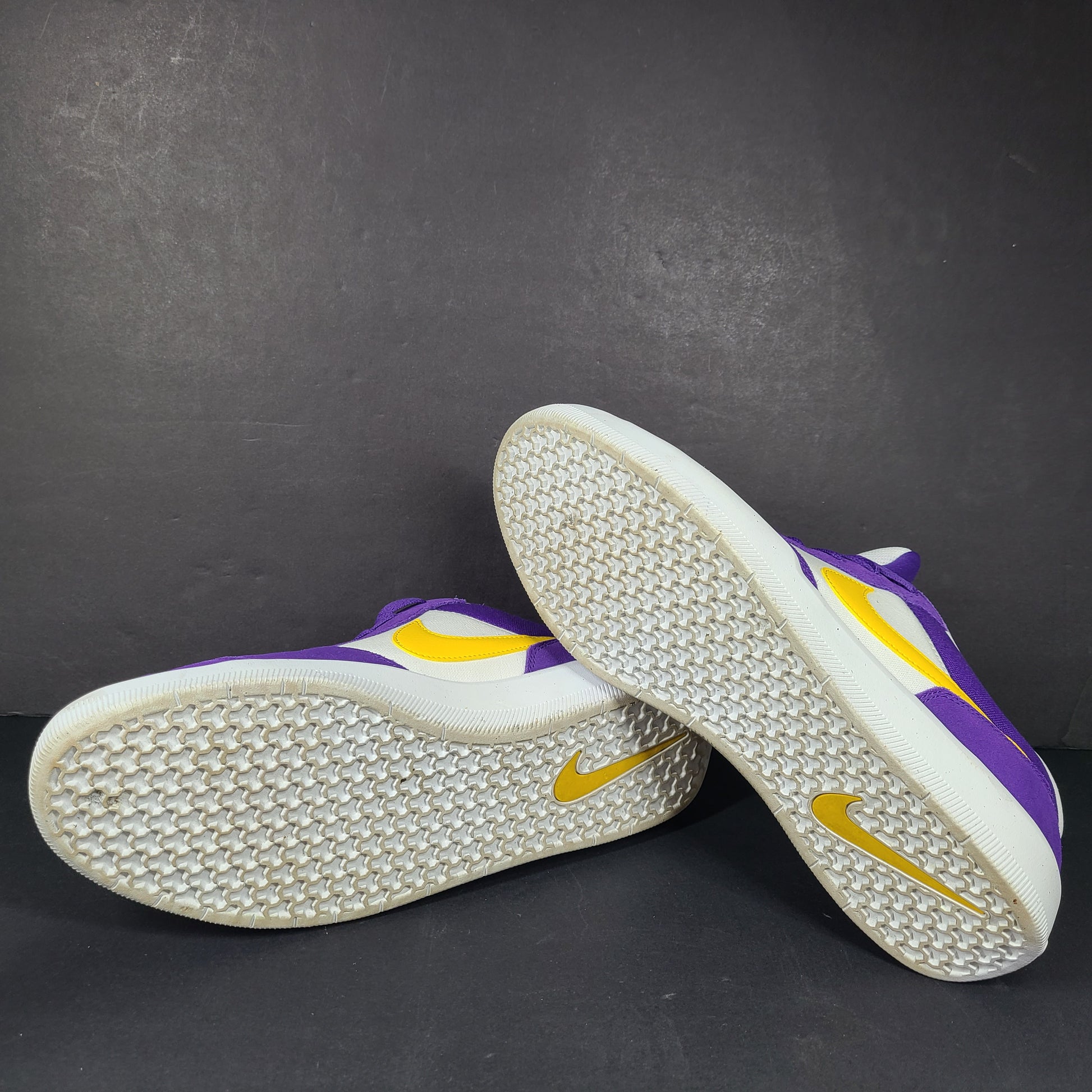 Nike SB Force 58 in purple, yellow and white offers a durable canvas-and-suede skate silhouette with responsive support and grip.