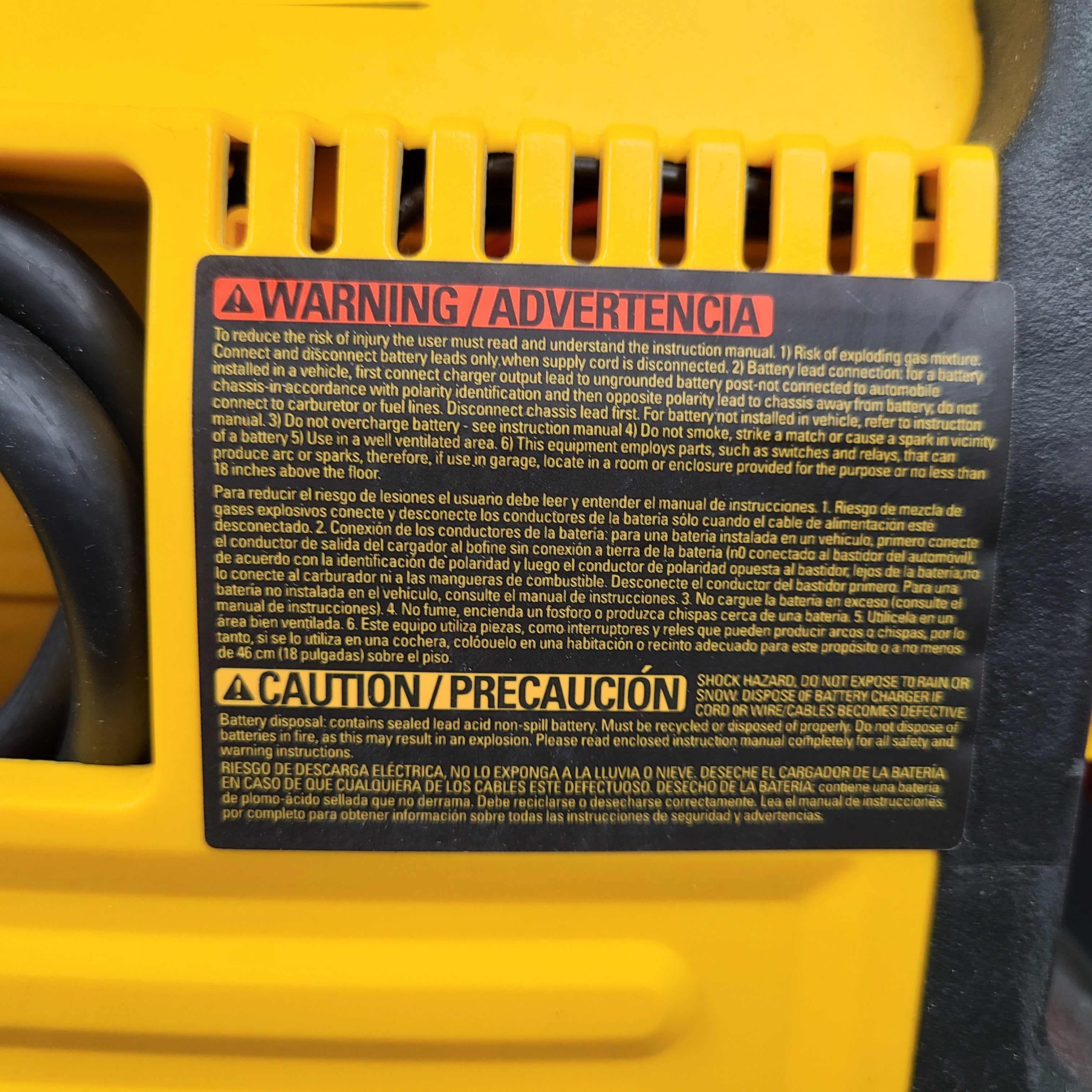 DeWalt DXAEJ14 portable jump starter and air compressor in black and yellow with heavy-duty clamps and USB power.