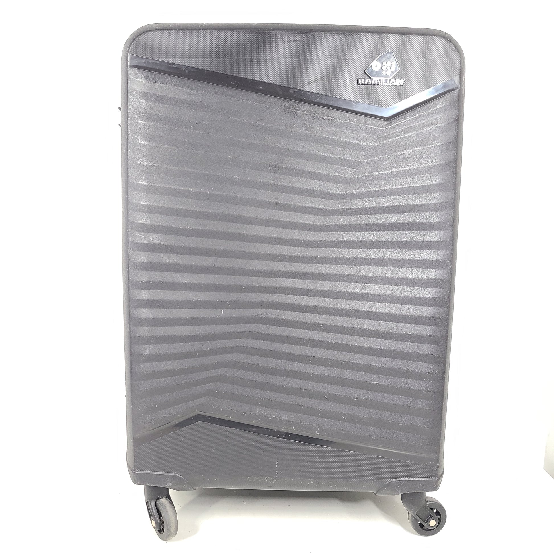 Black Kamiliant hard-shell spinner suitcase with four smooth-rolling wheels and a telescoping handle.