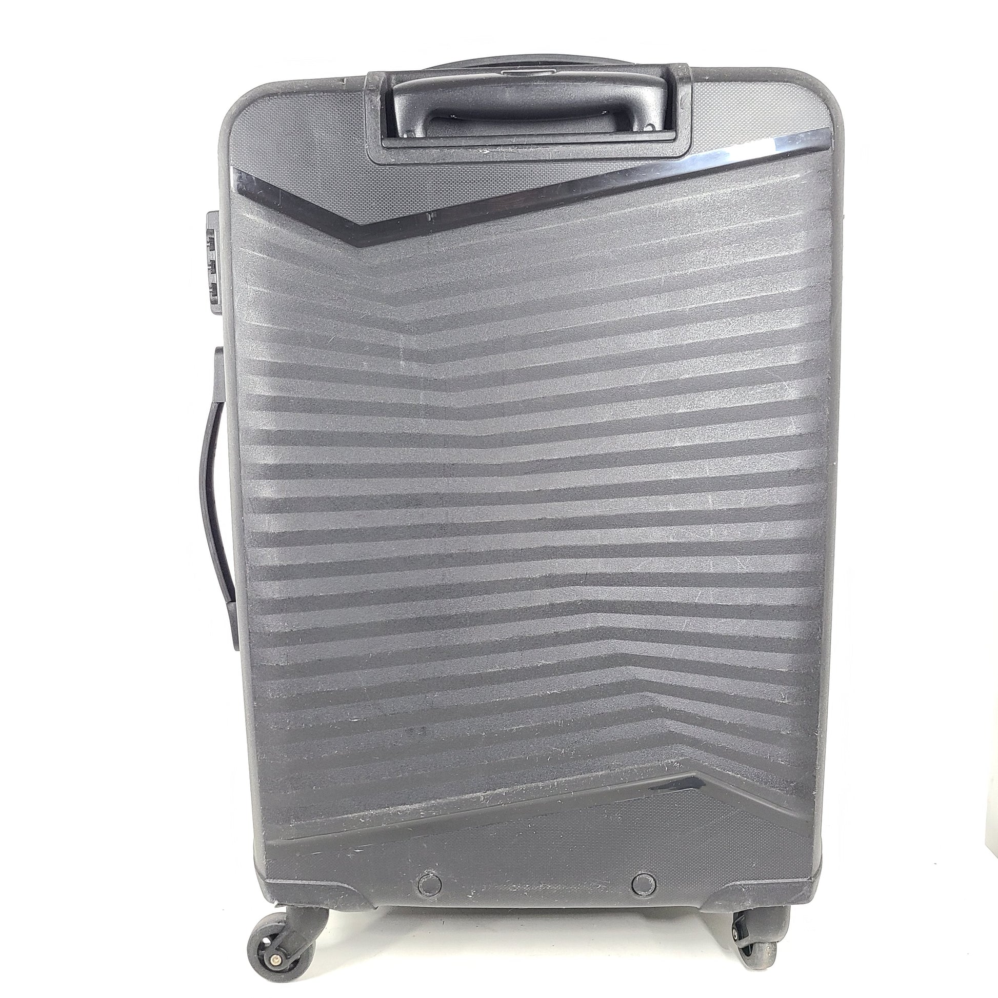 Black Kamiliant hard-shell spinner suitcase with four smooth-rolling wheels and a telescoping handle.