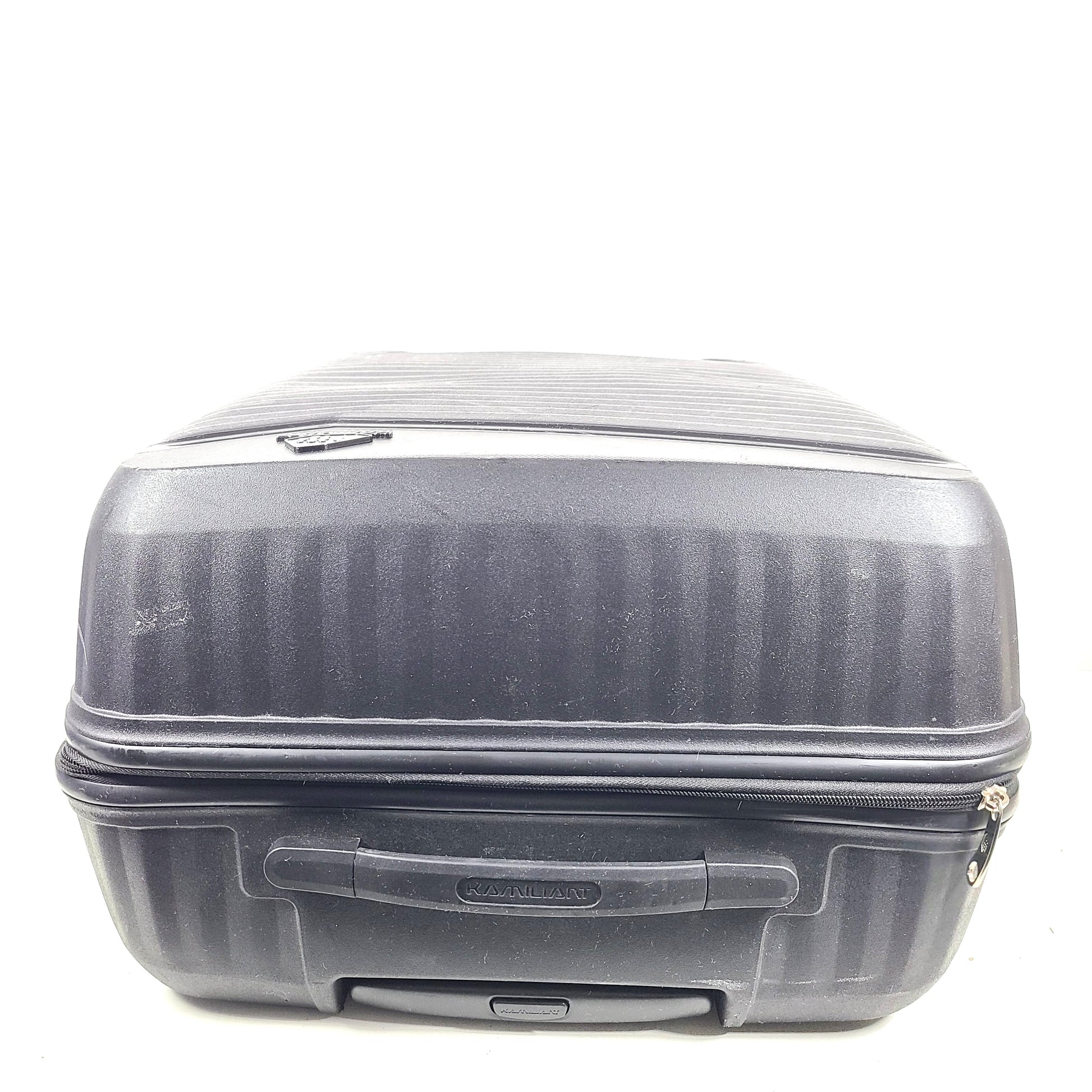 Black Kamiliant hard-shell spinner suitcase with four smooth-rolling wheels and a telescoping handle.