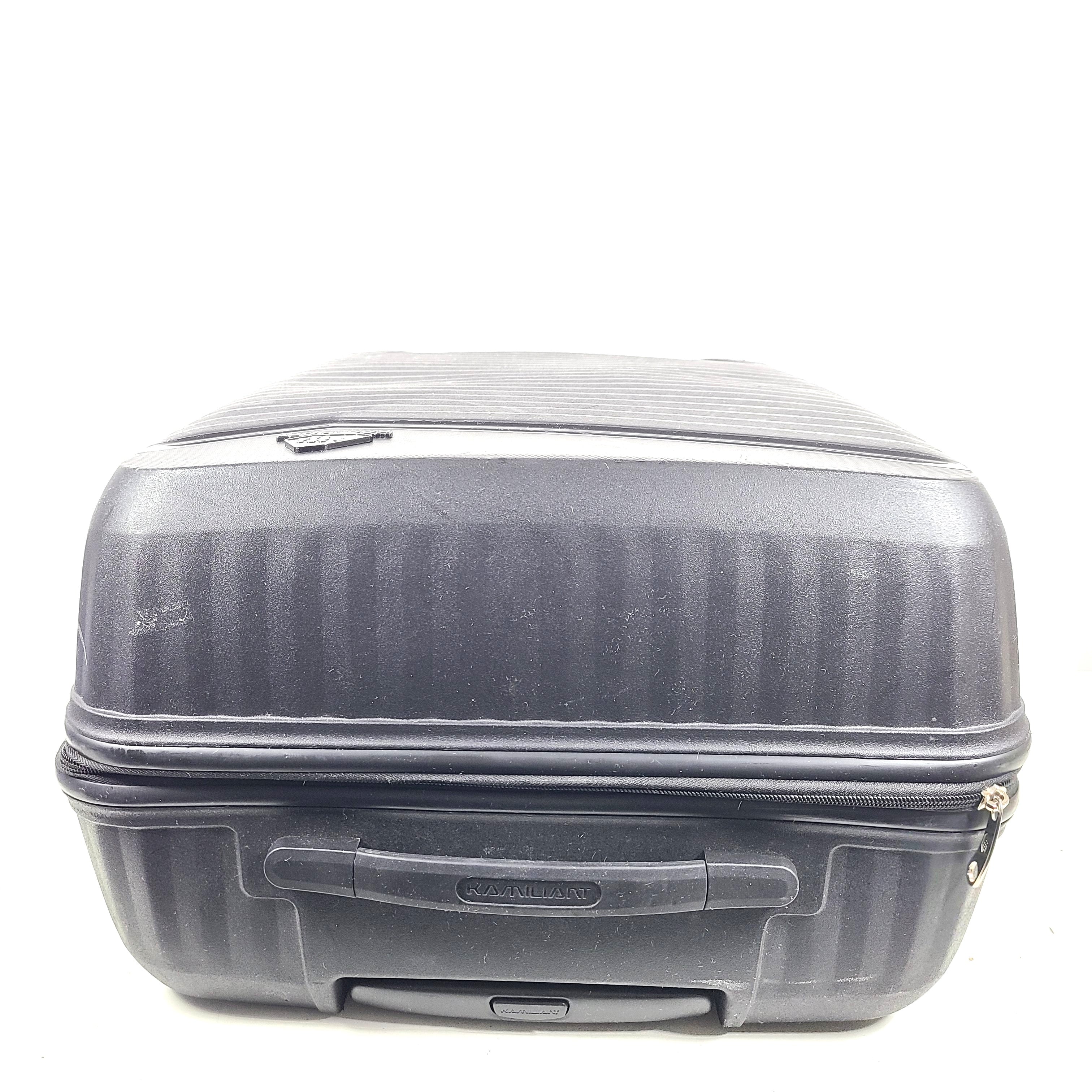 Black Kamiliant hard-shell spinner suitcase with four smooth-rolling wheels and a telescoping handle.