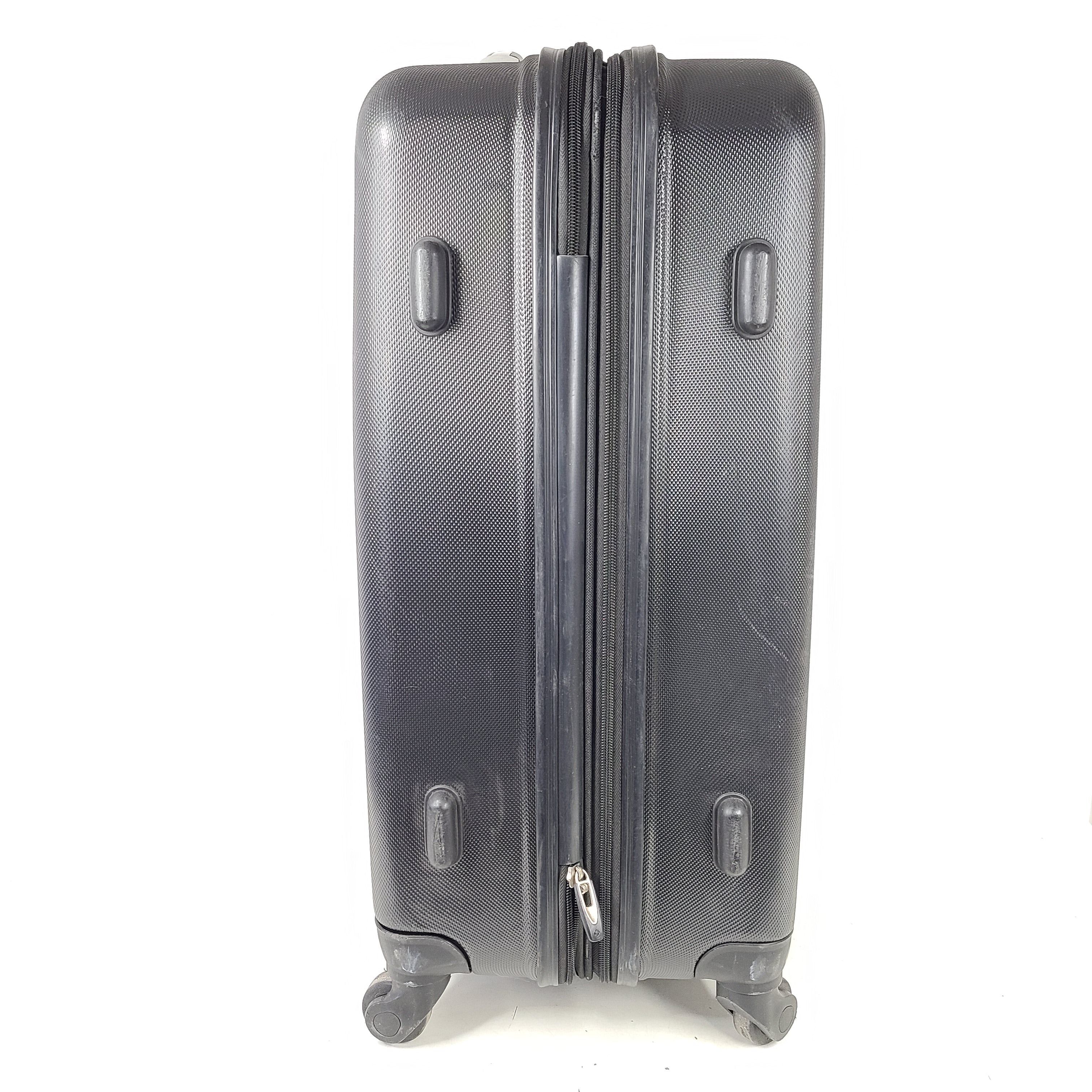 Black Samsonite suitcase model 5000230 with light scuff marks and a clean interior.