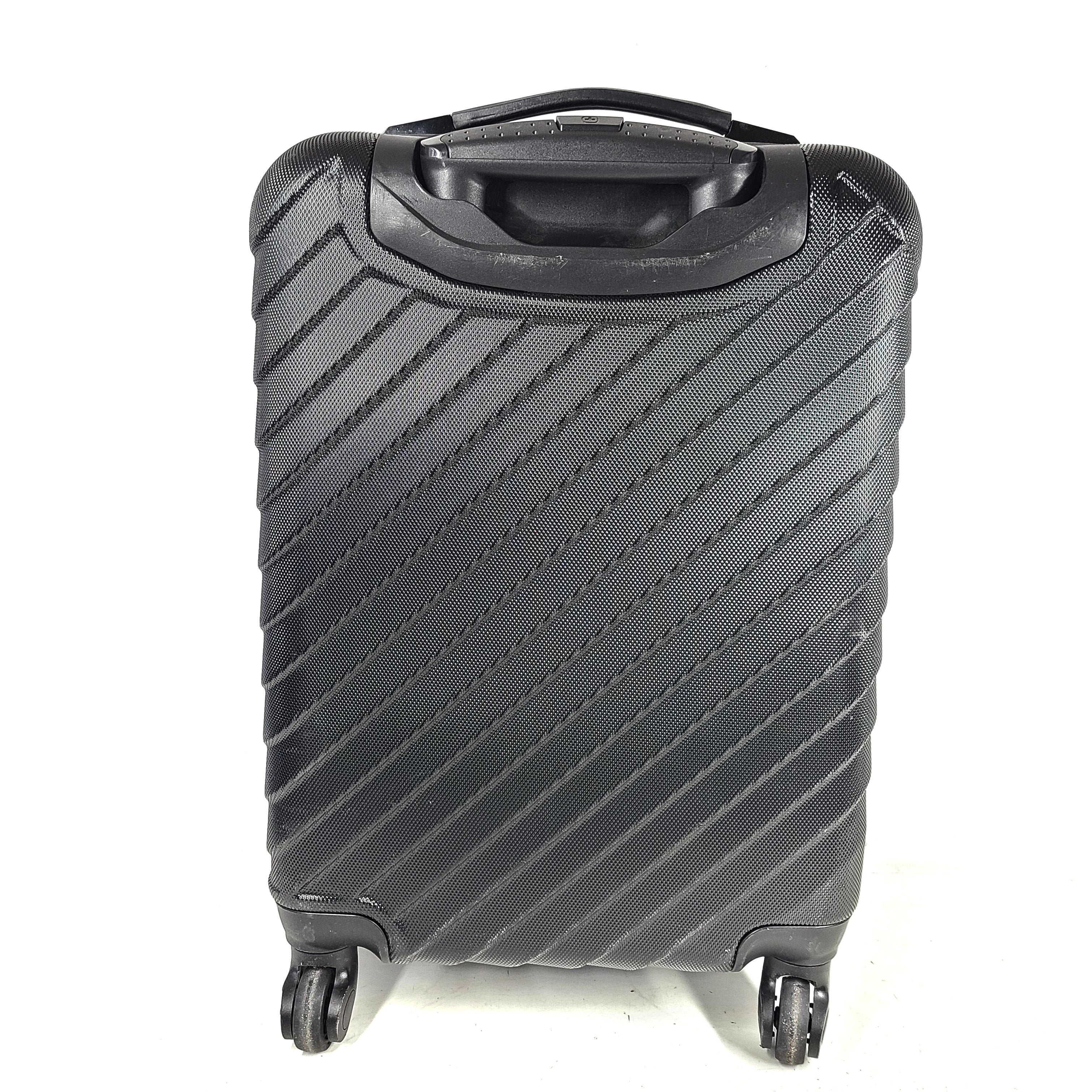 Black SwissGear suitcase with interior logo lining and scuff marks on the exterior.