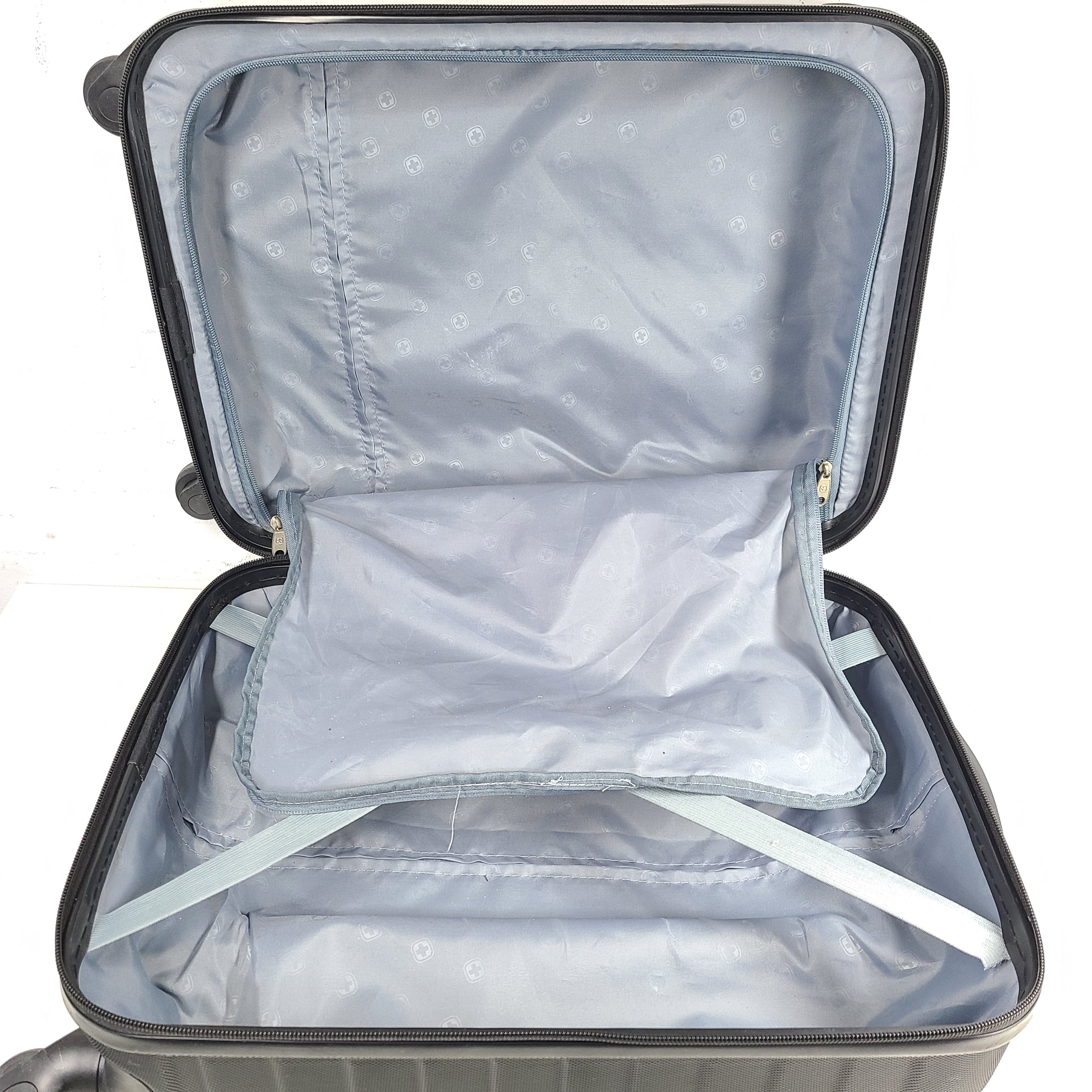 Black SwissGear suitcase with interior logo lining and scuff marks on the exterior.