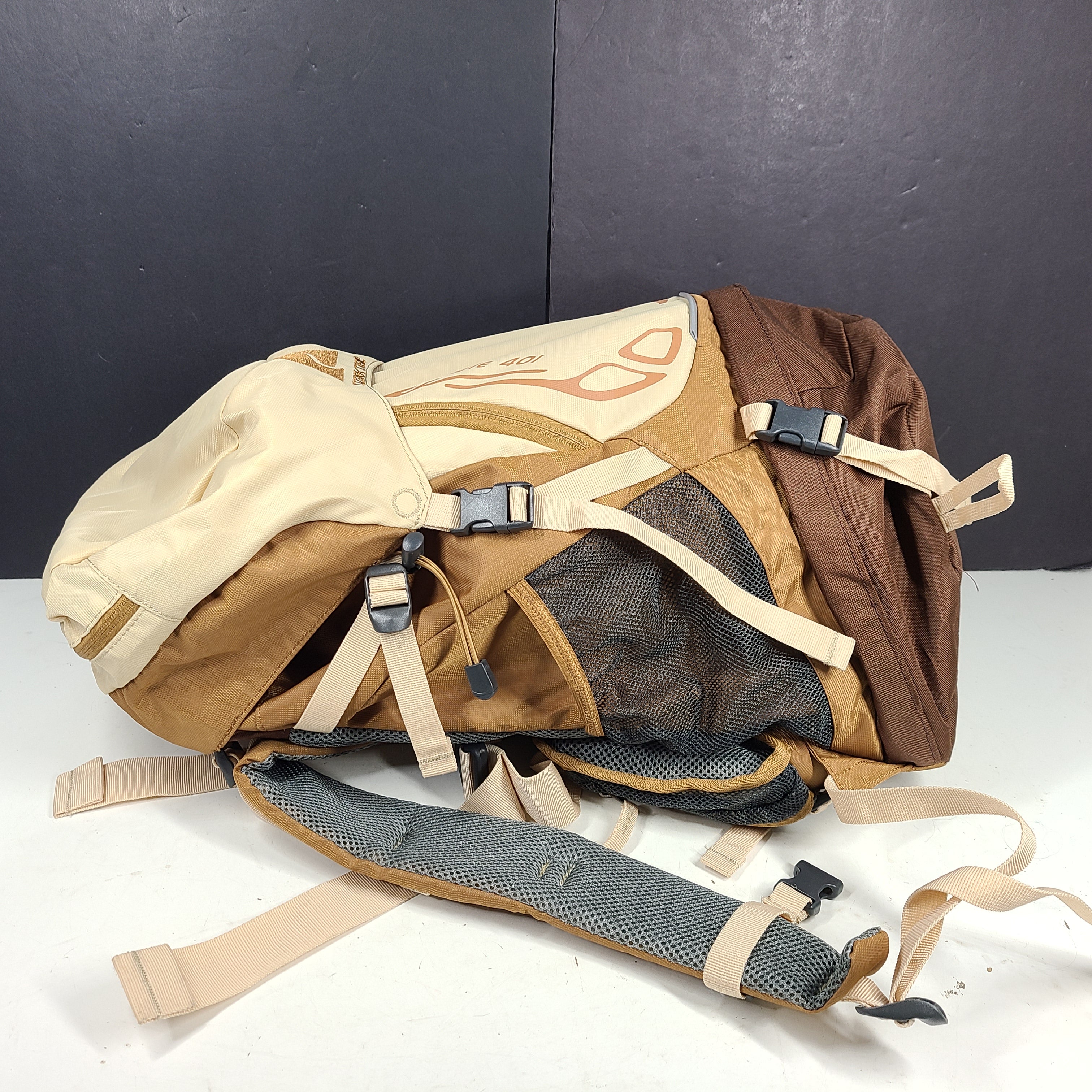 Beige and brown Ozark Trail Eagle 40L hiking backpack designed for outdoor use.