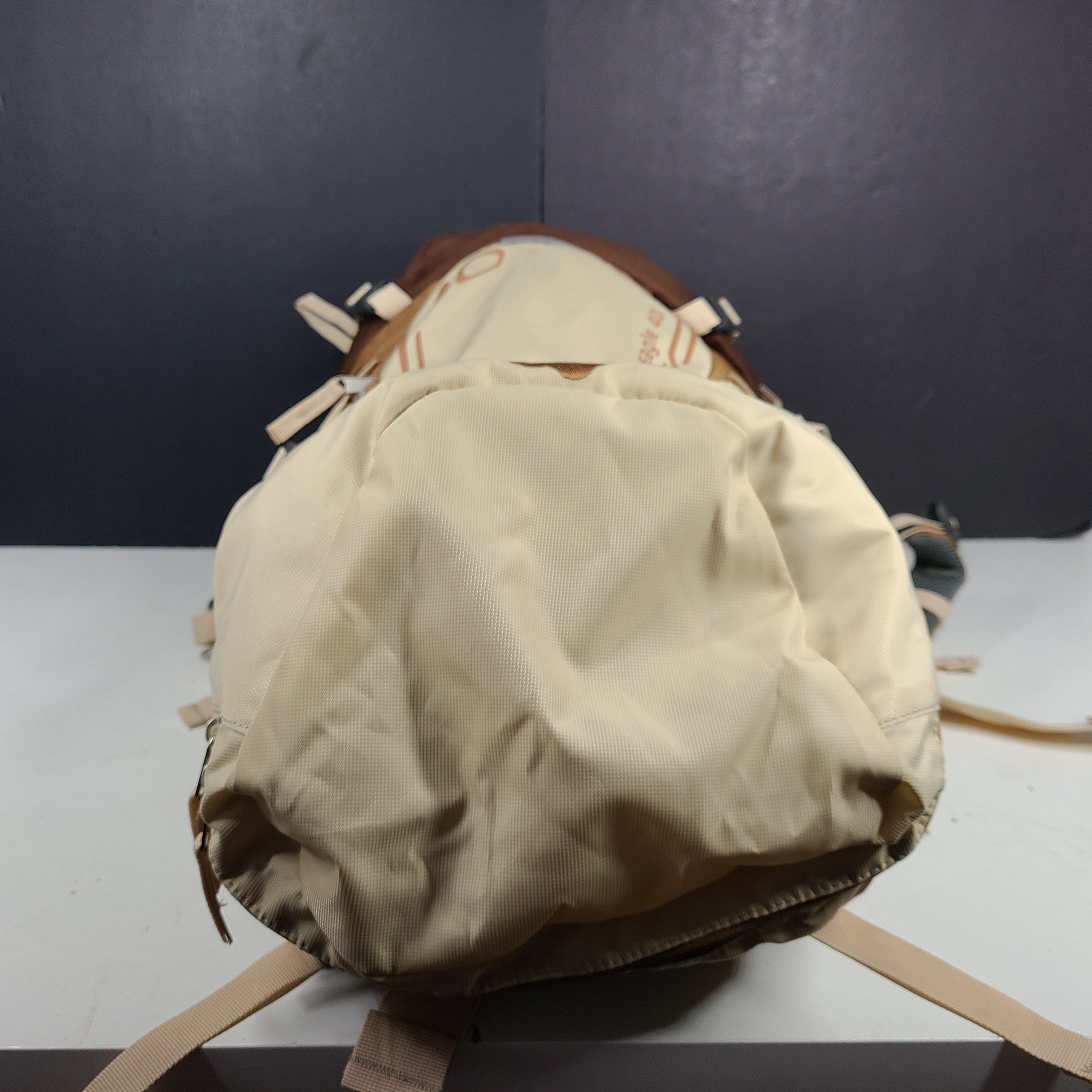 Beige and brown Ozark Trail Eagle 40L hiking backpack designed for outdoor use.