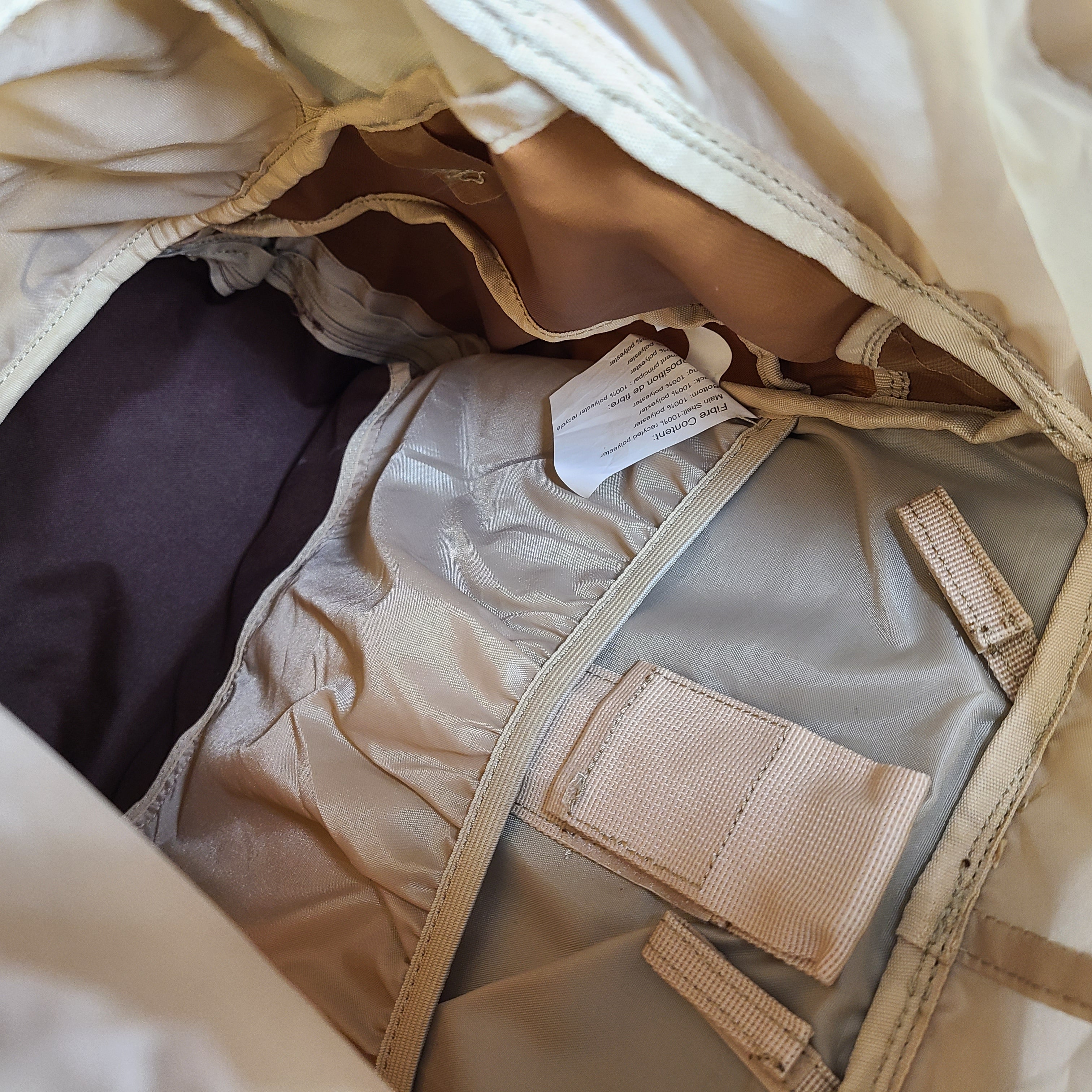 Beige and brown Ozark Trail Eagle 40L hiking backpack designed for outdoor use.