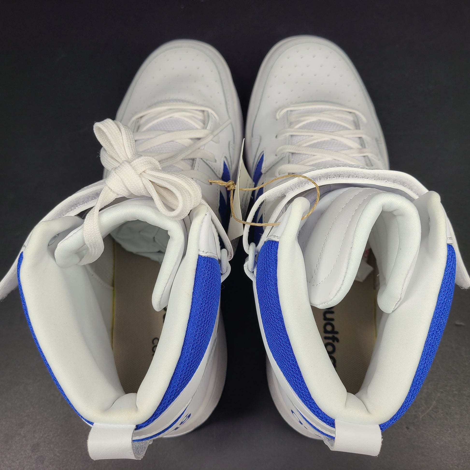 White and blue Adidas Postmove Mid basketball shoes, model GW5525, US 10½.