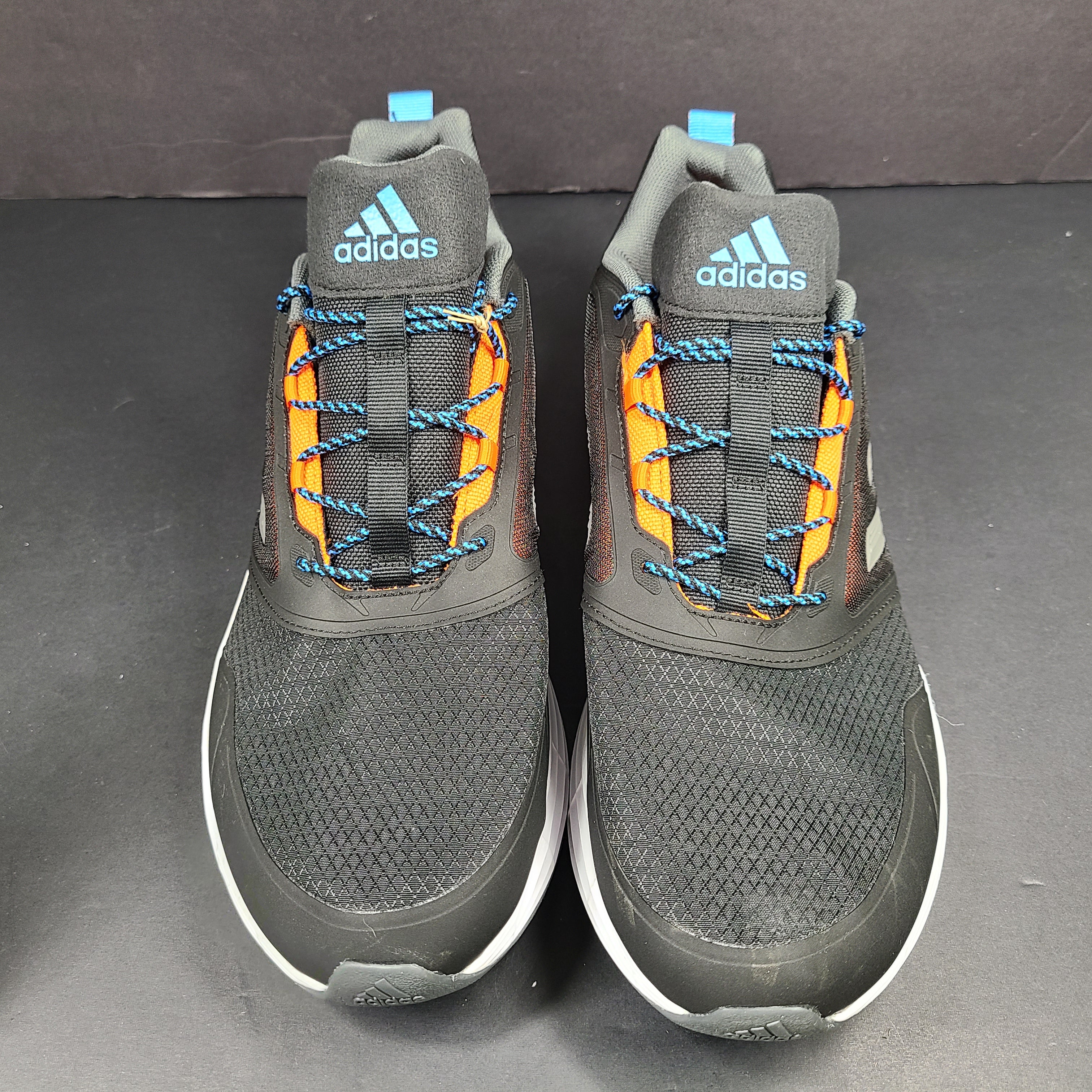 Adidas Duramo Protect running shoes in black, orange and blue, model GW4151, US size 11.5.