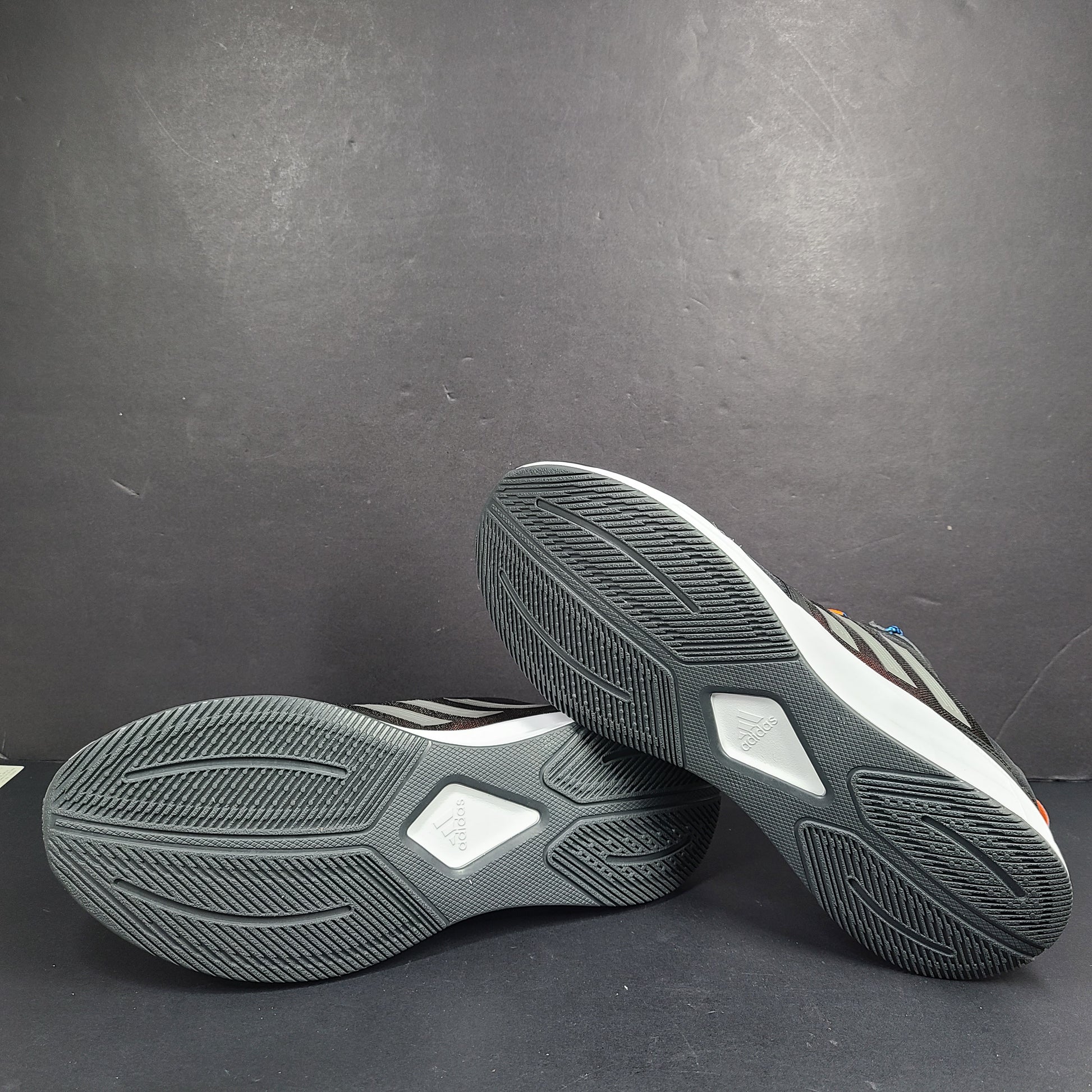 Adidas Duramo Protect running shoes in black, orange and blue, model GW4151, US size 11.5.