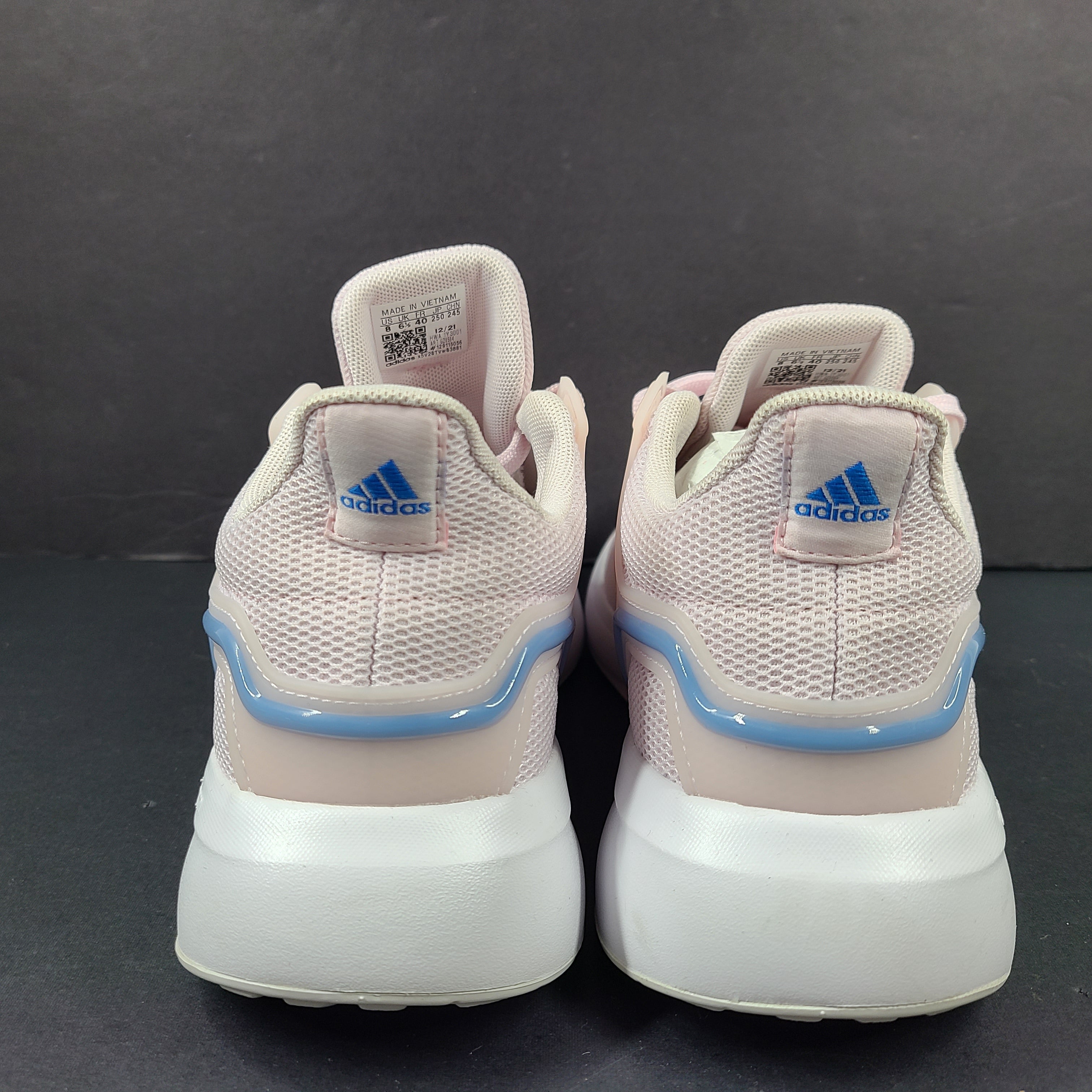 Lightweight pink Adidas running sneakers with Cloudfoam cushioning in US size 8.