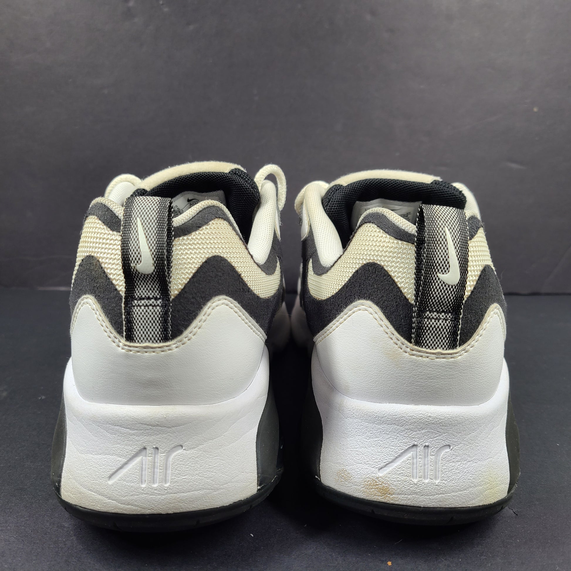 Nike Air Max 200 in black, white and beige with light sole wear and US size 9.5.